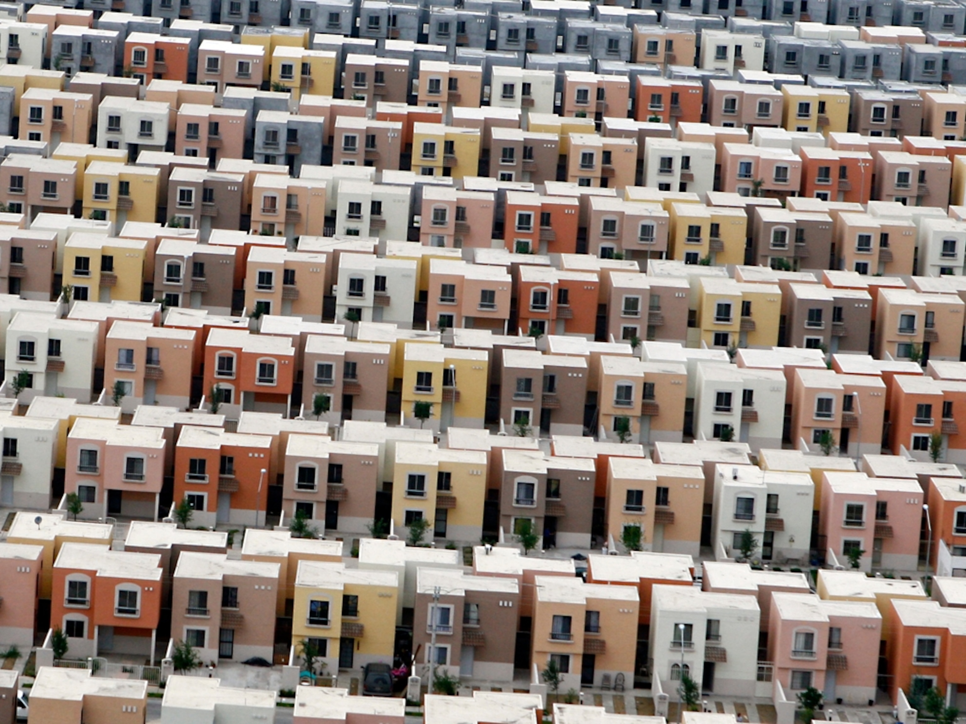 an aerial view of rows of houses in Monterrey, Mexico.