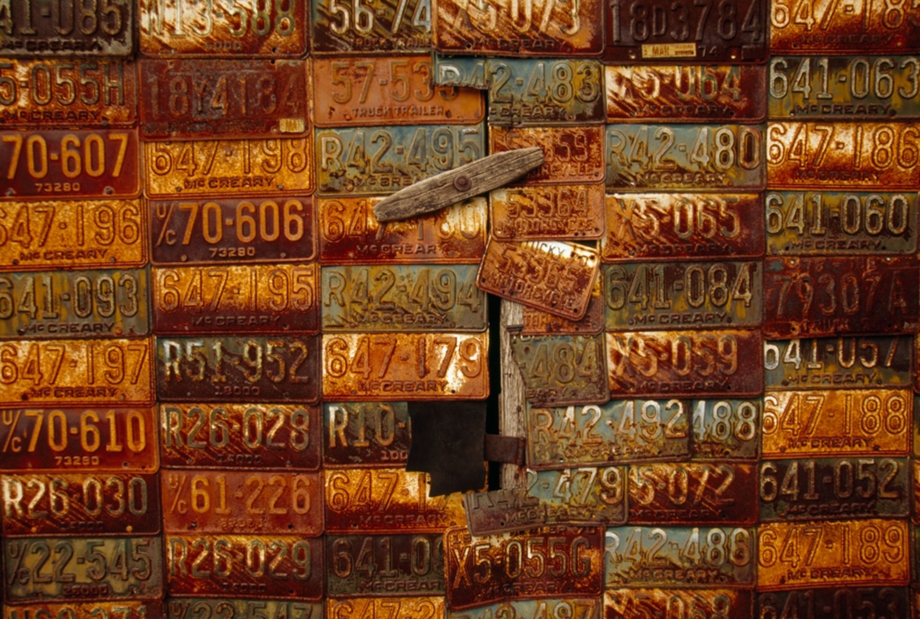 rusty license plates on a wall in Kentucky