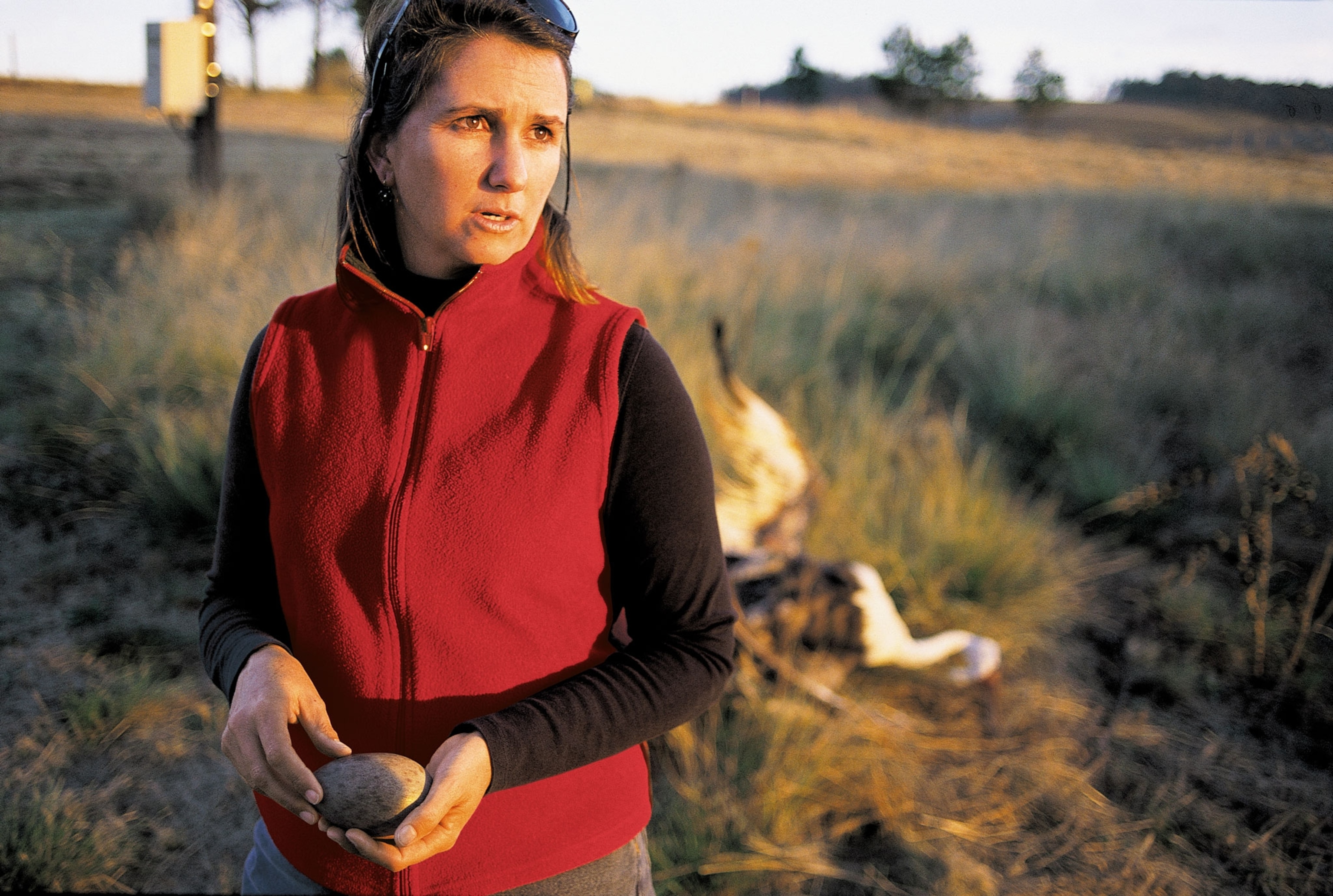 Lindy Rodwell van Hasselt holding a wattled crane egg