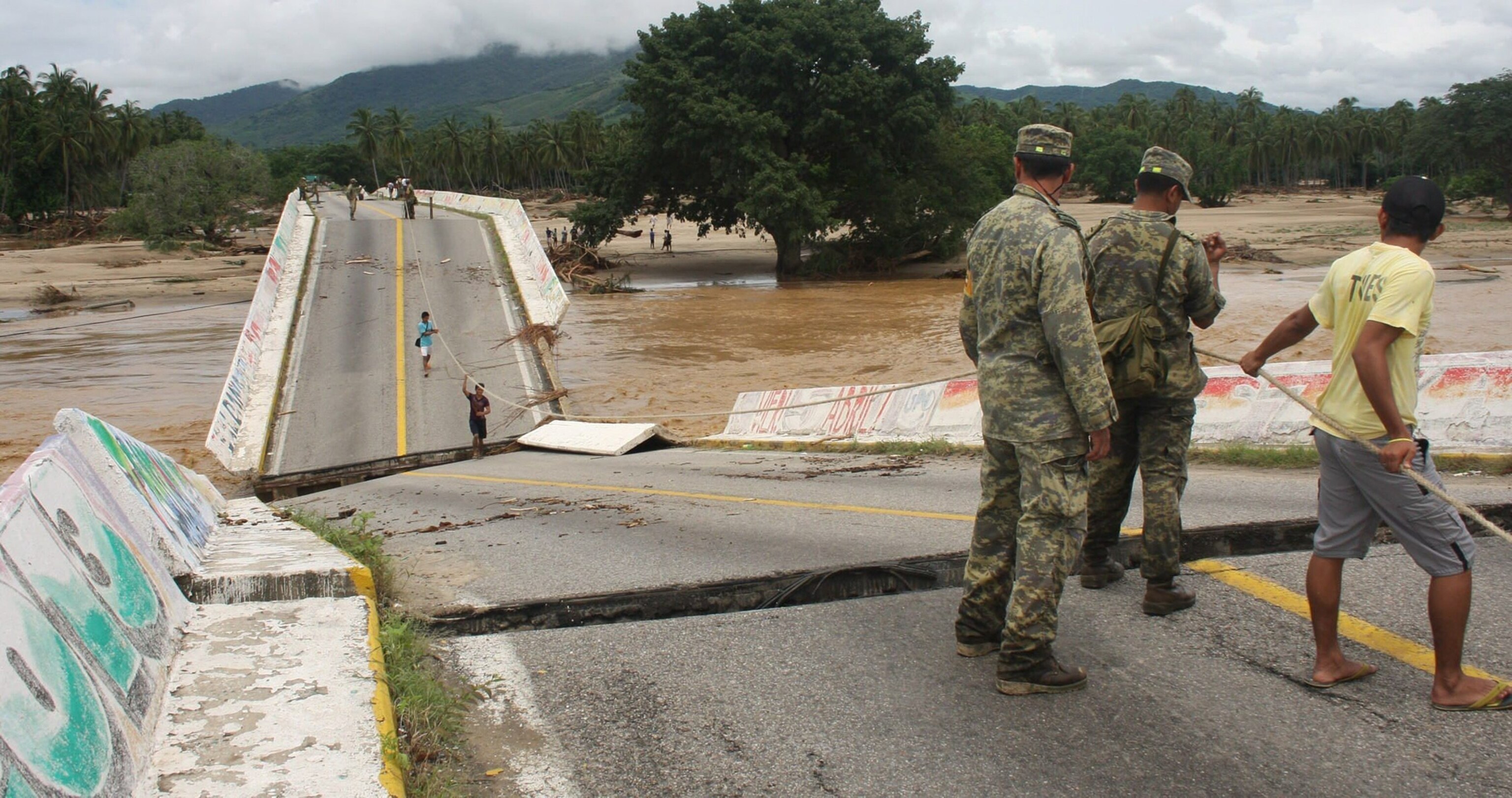 a collapsed bridge in Cocuya de BenItez, Guerrero state, Mexico