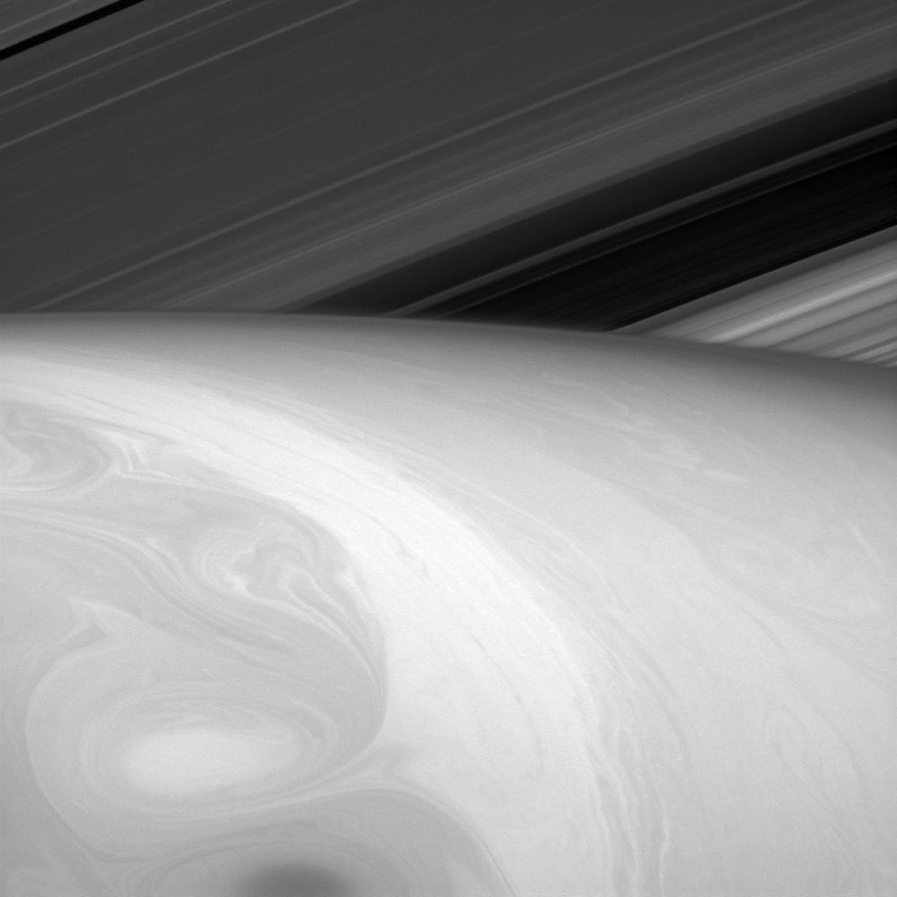 What the viewer might perceive to be Saturn's surface is really just the tops of its uppermost cloud layers. Everything we see is the result of fluid dynamics.
