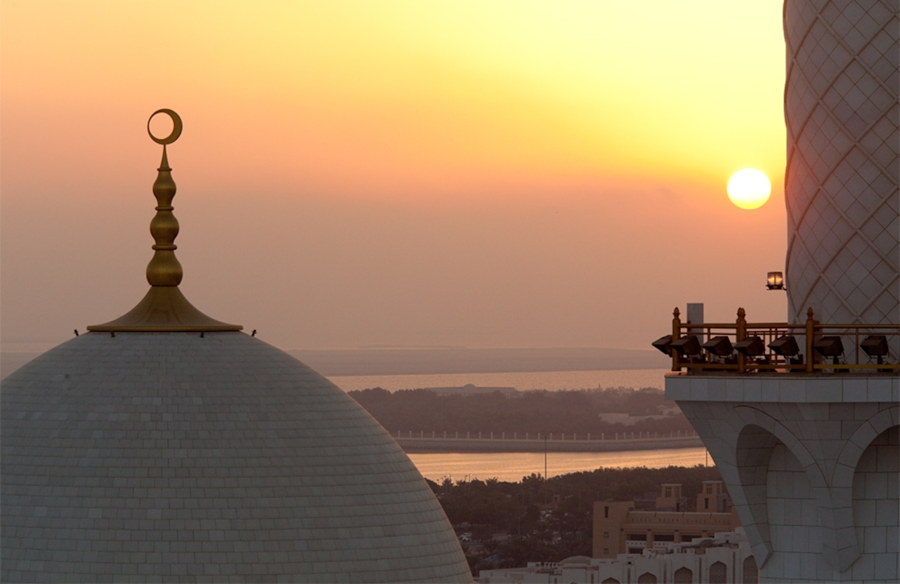 View outside the Sheik Zayed Mosque in Abu Dhabi at sunset