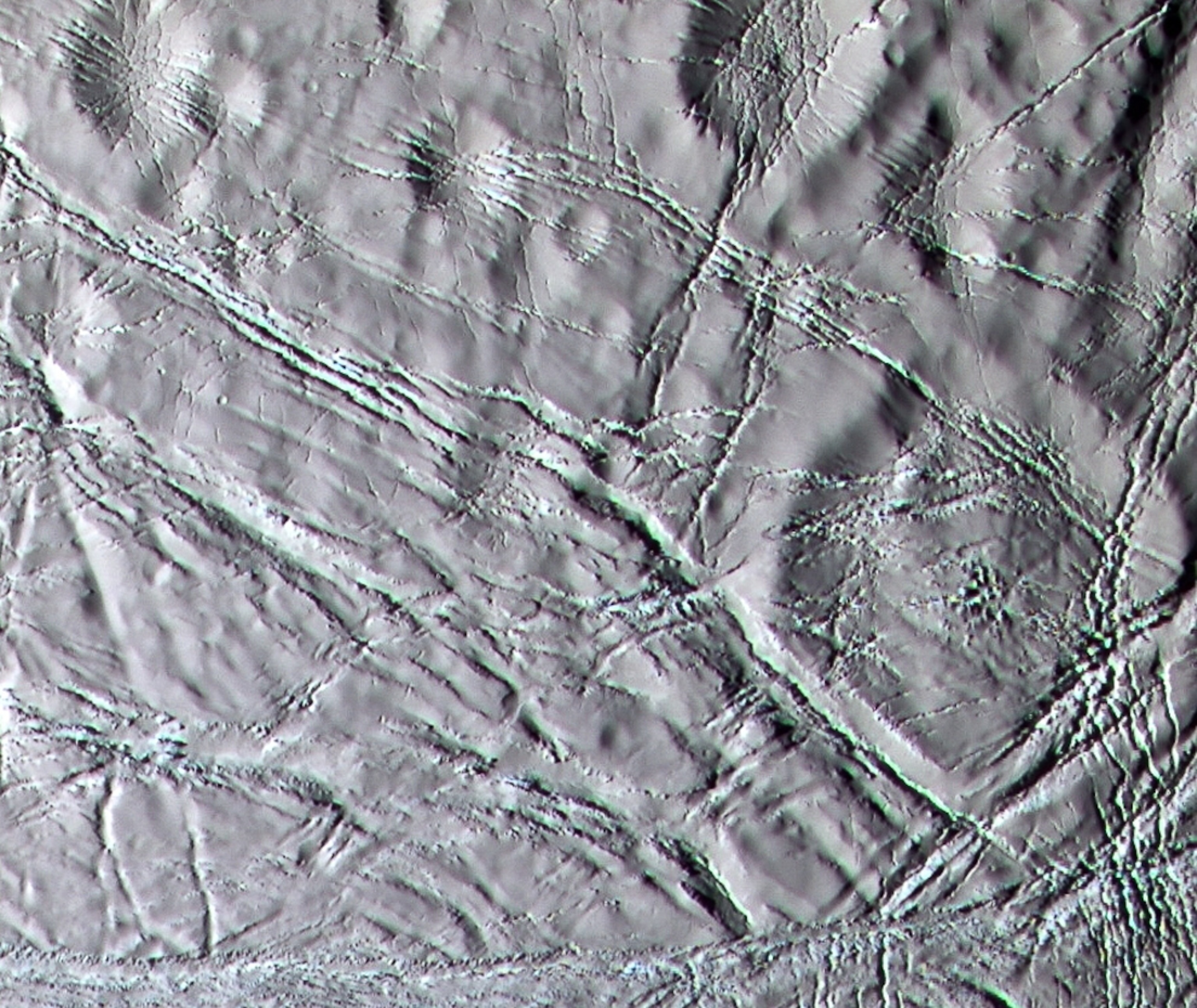 Saturn moon picture: Enceladus craters and fissures that appear to be covered with snow