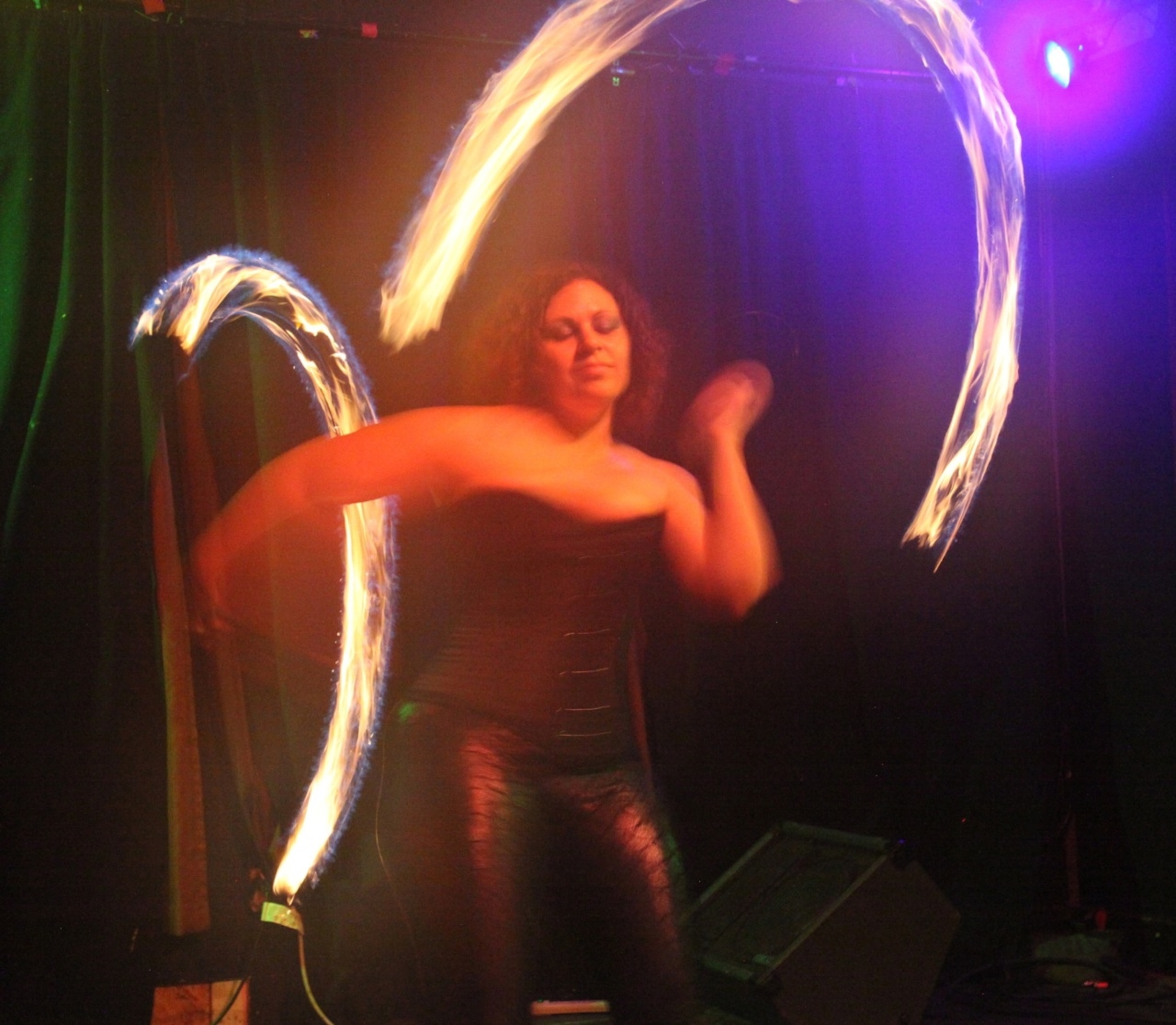 Mistress Kali dances with fire on stage at Siberia (Photo by Andrew Evans, National Geographic Travel)