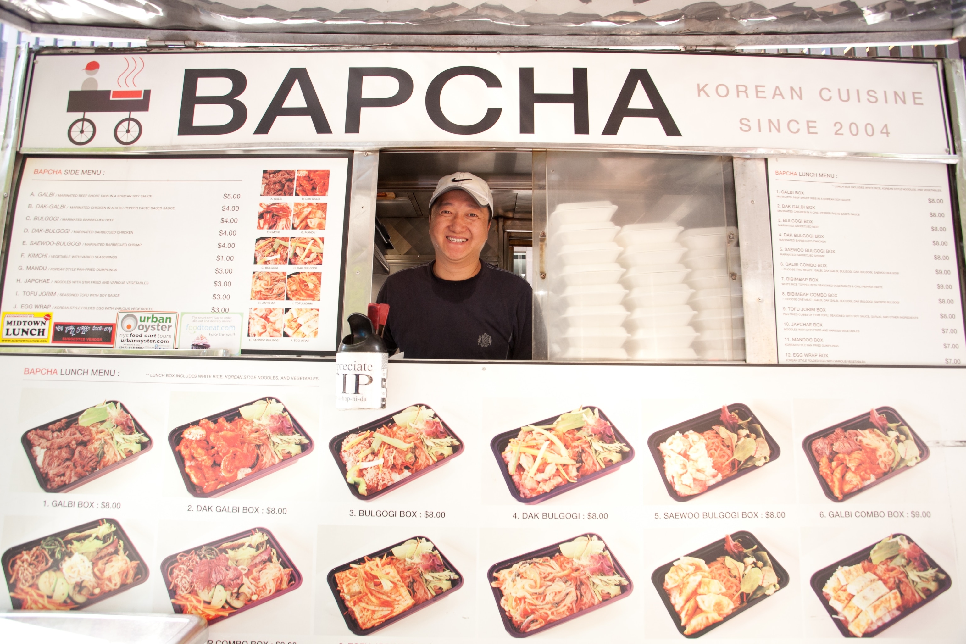 John Lee and his Bapcha Korean food cart on 49th Street. (Photograph by Jennifer Strader)