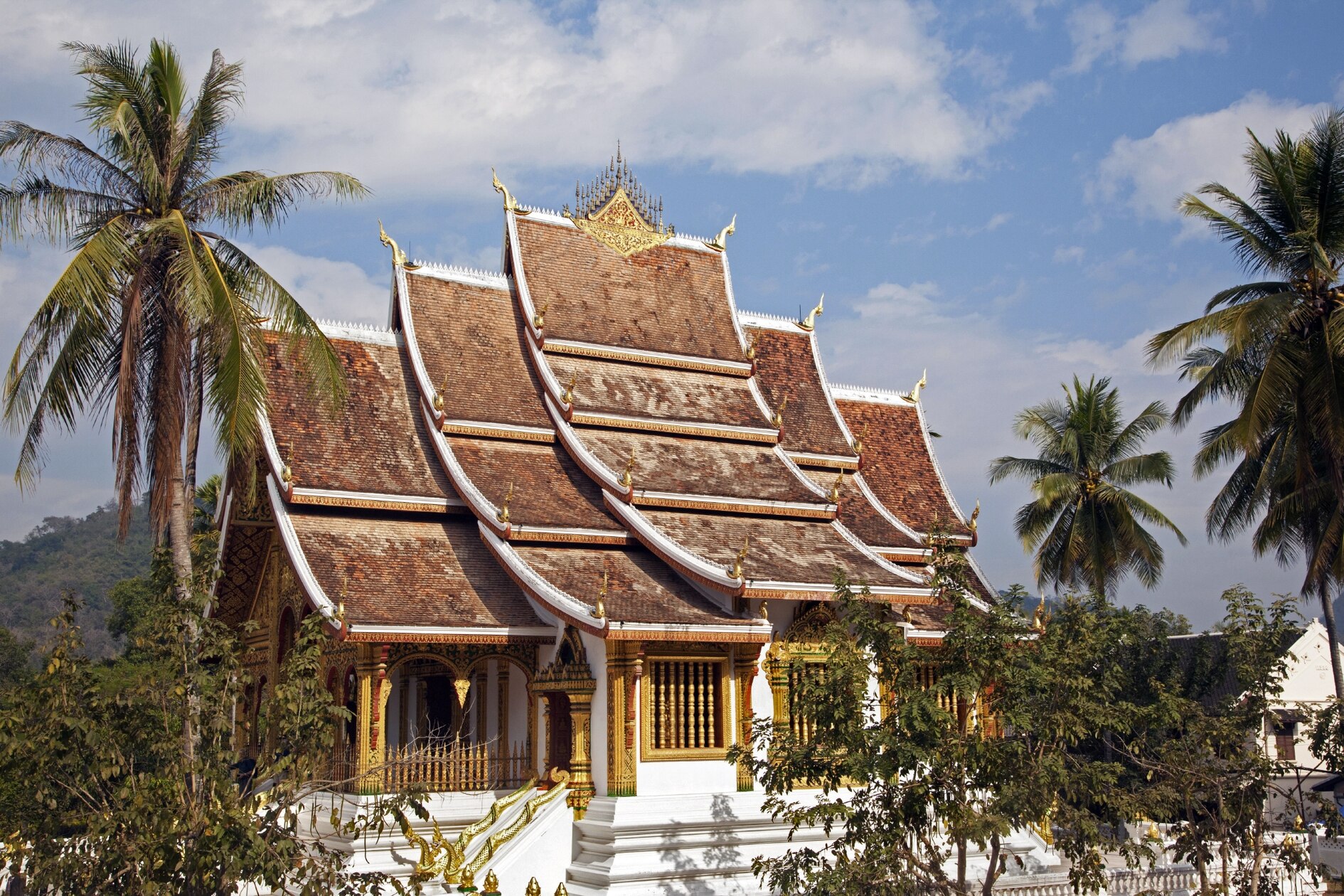 Sloping roof of The Royal Palace in Luang Prabang is covered by naga on every corner