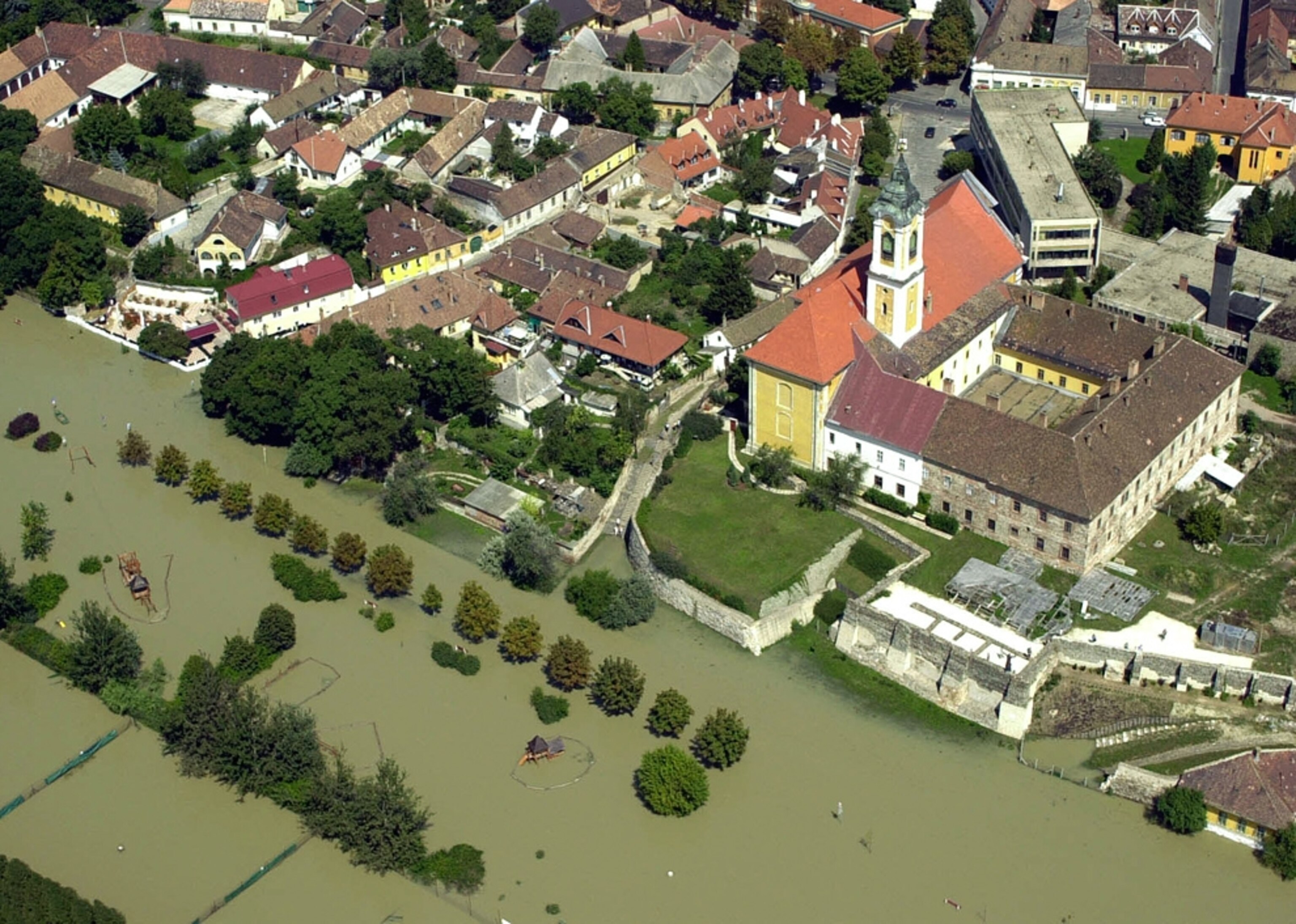 An aerial view of flooded buildings in Hungary