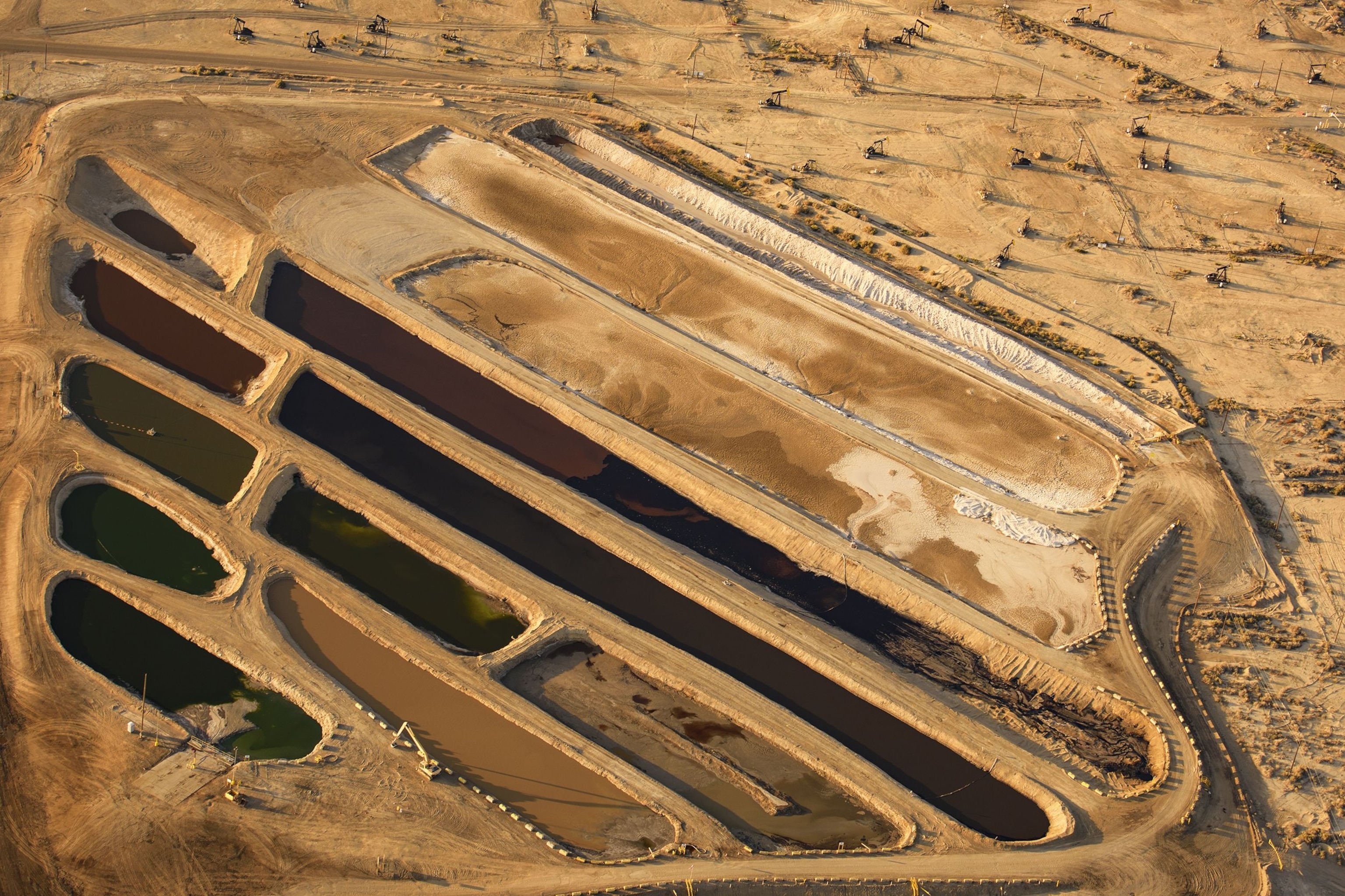 Aerial picture of oil wastewater pits in Kern County, California