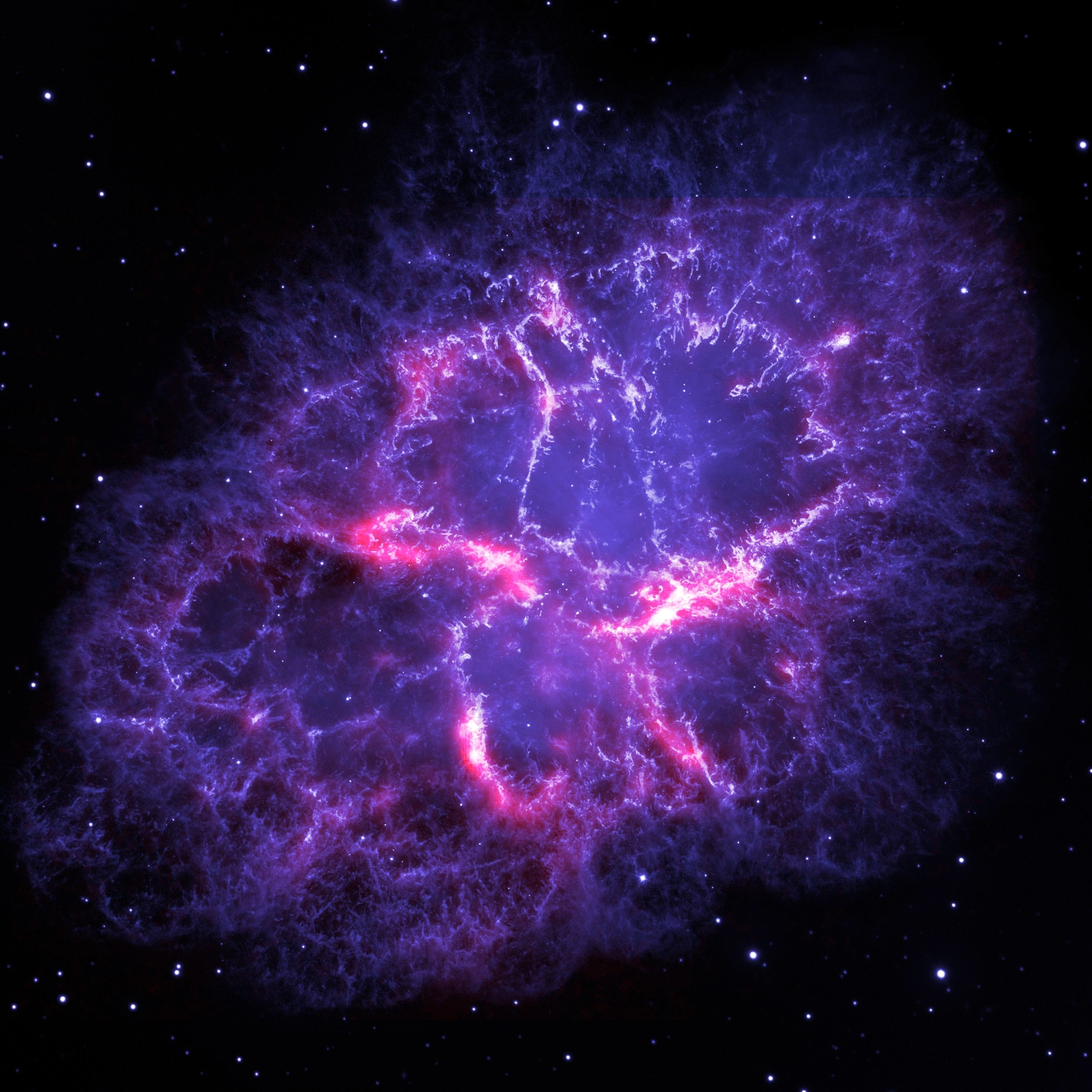 Composite image of the Crab Nebula, an iconic supernova remnant in our Milky Way galaxy, as viewed by the Herschel Space Observatory and the Hubble Space Telescope