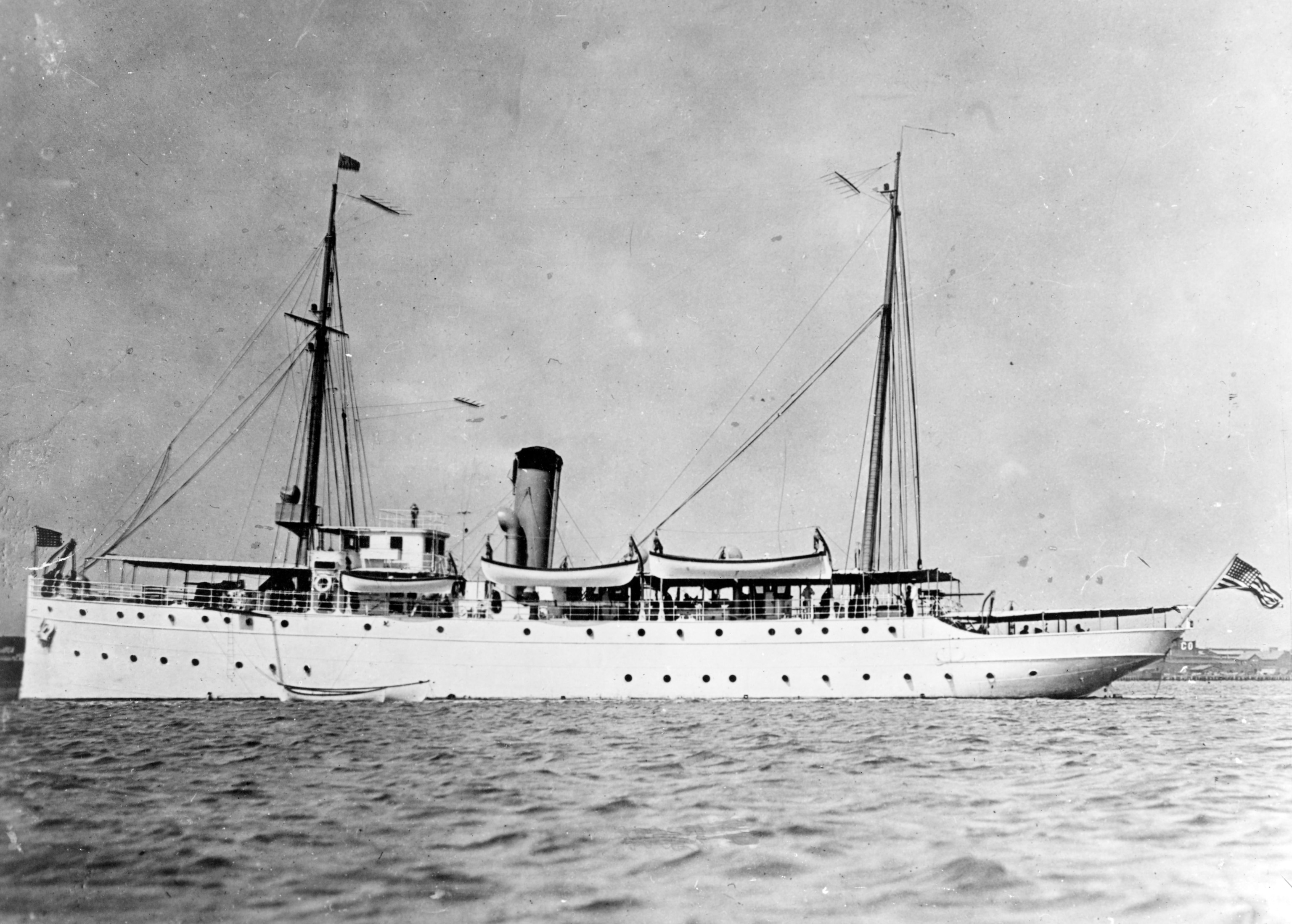 A black and white image of a boat on water