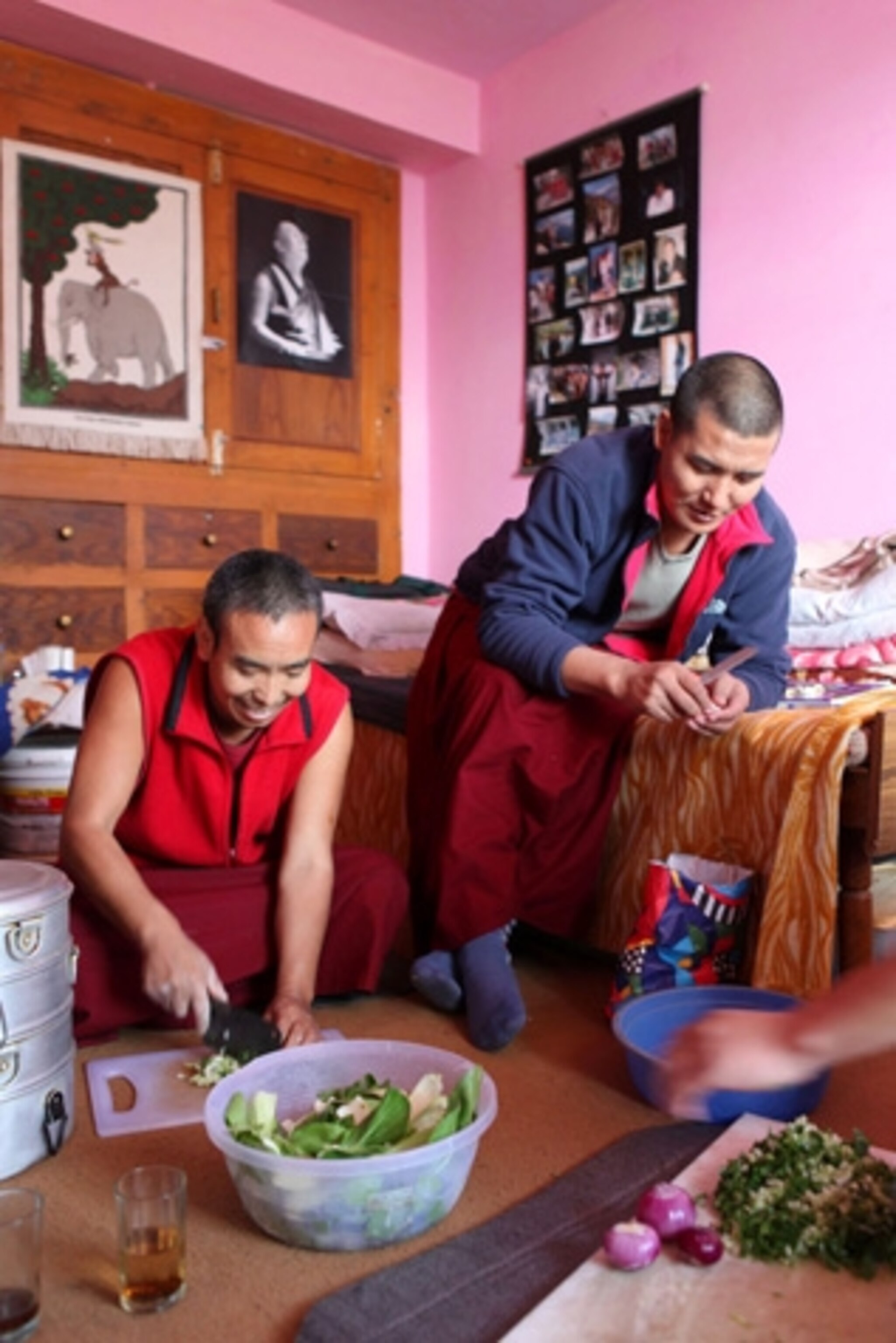 Two monks preparing me a traditional Tibetan lunch. (Photograph by Jill Schneider)