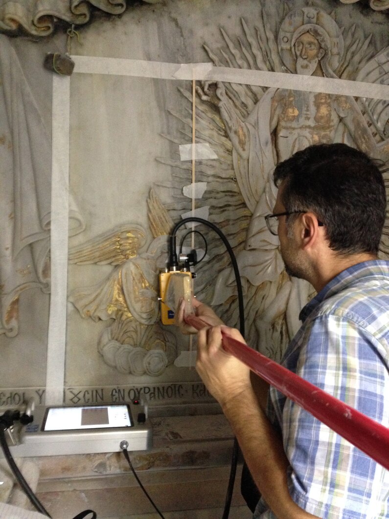 engineer assessing wall