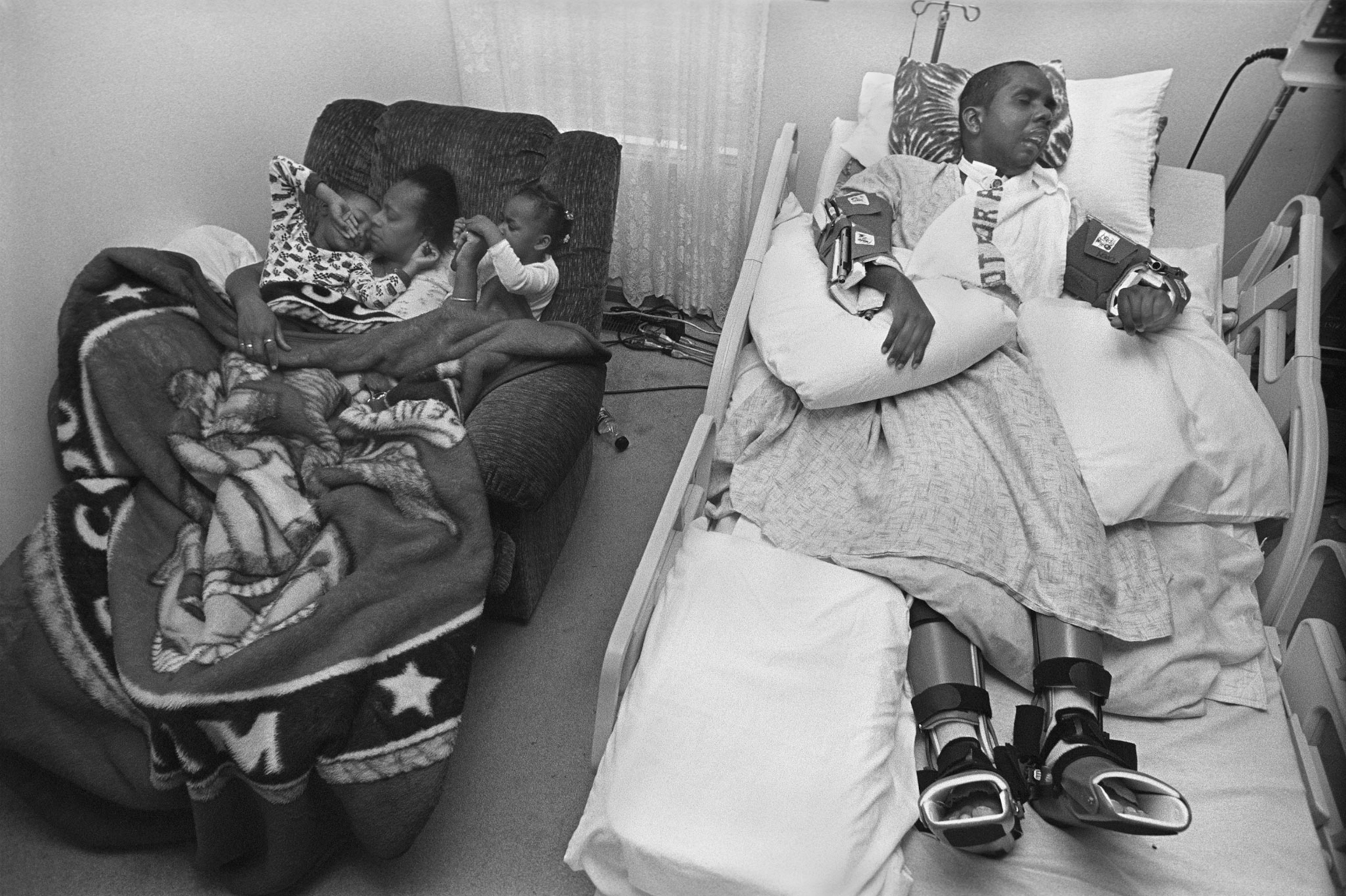man in hospital bed