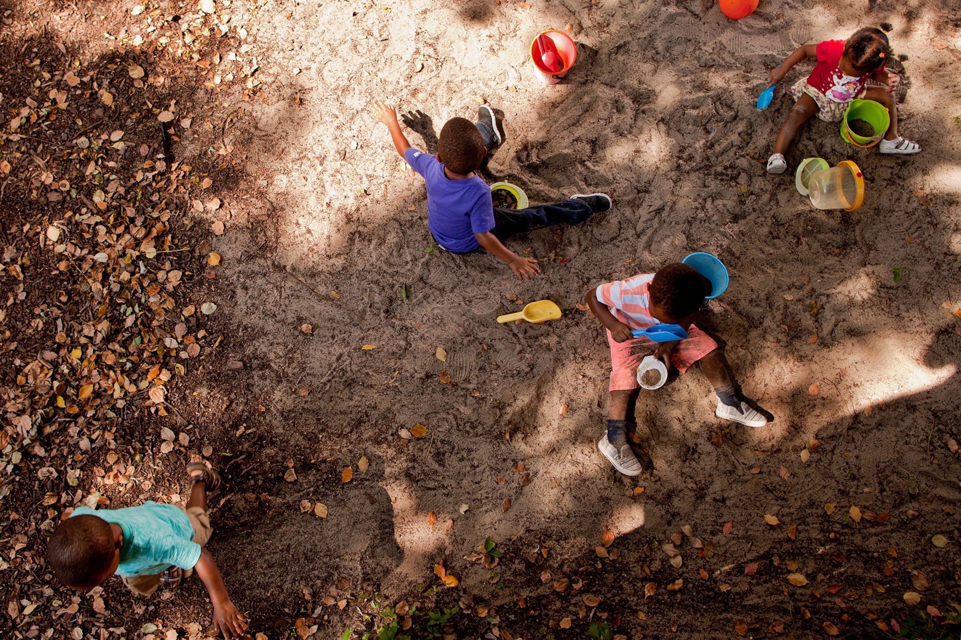 children playing in a sandbox