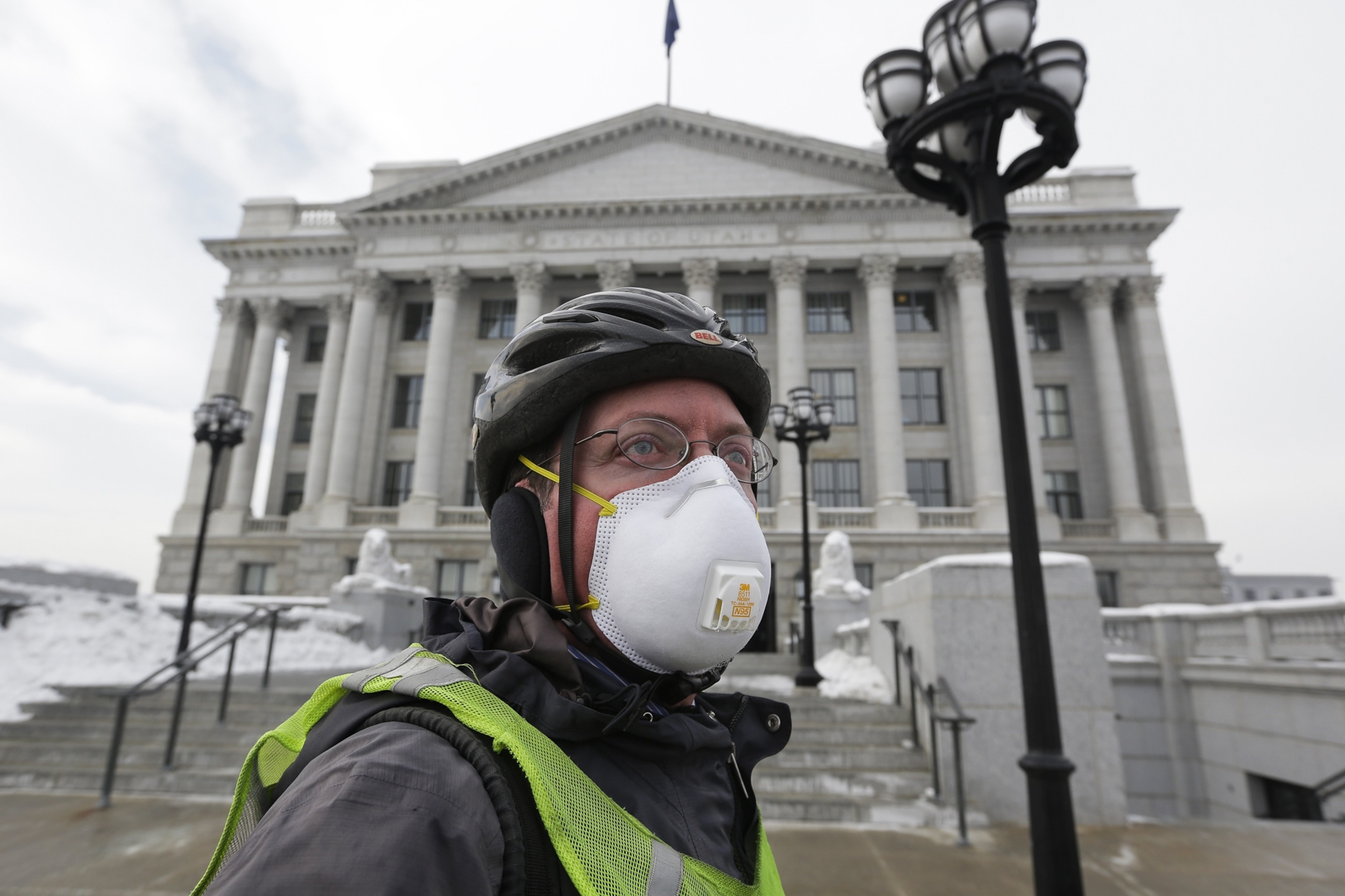 a visitor near the receding waters at Folsom Lake.