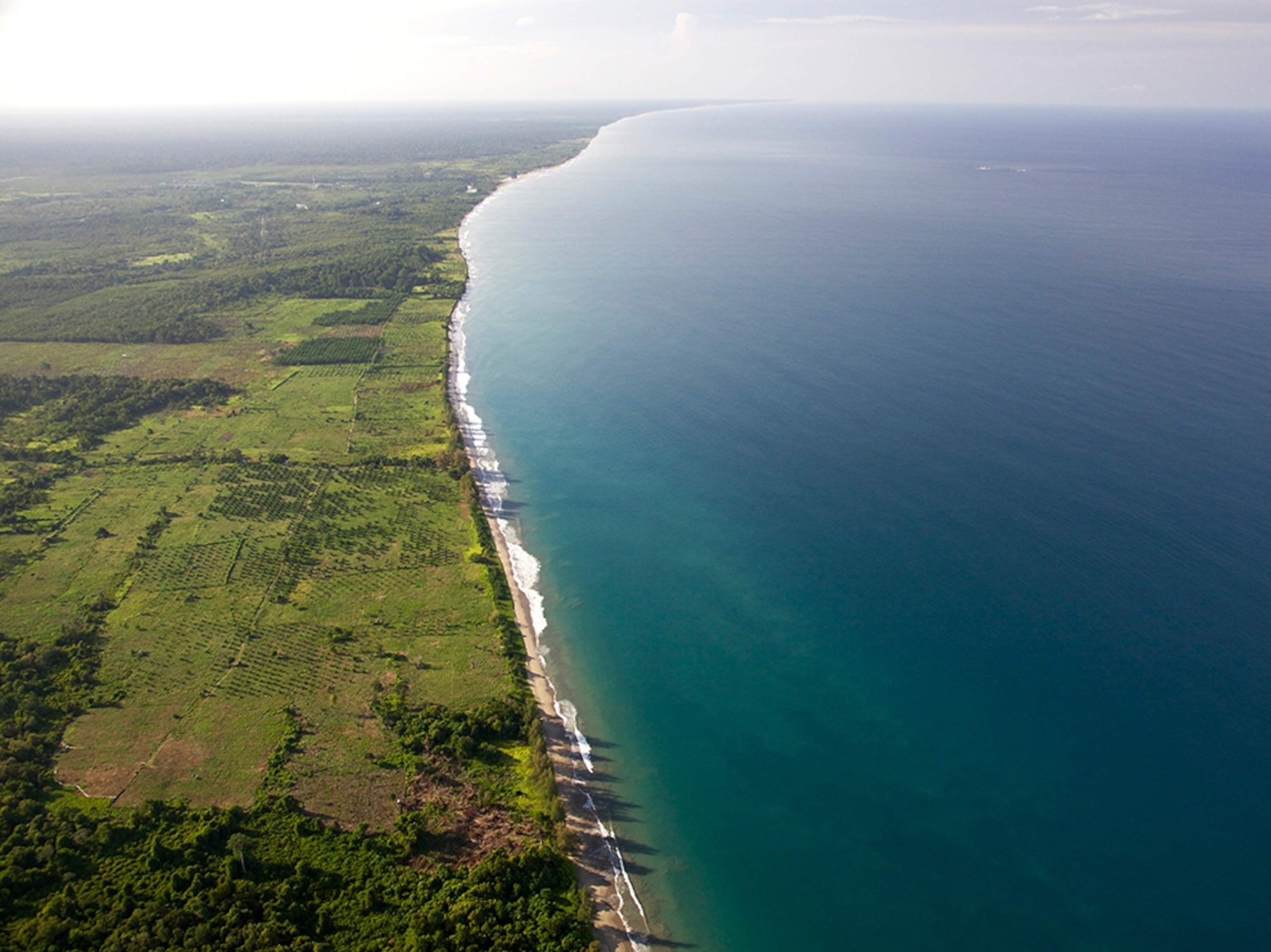 palm oil plantations, human habitation, converted landscape in and along the edges of the Leuser Ecosystem