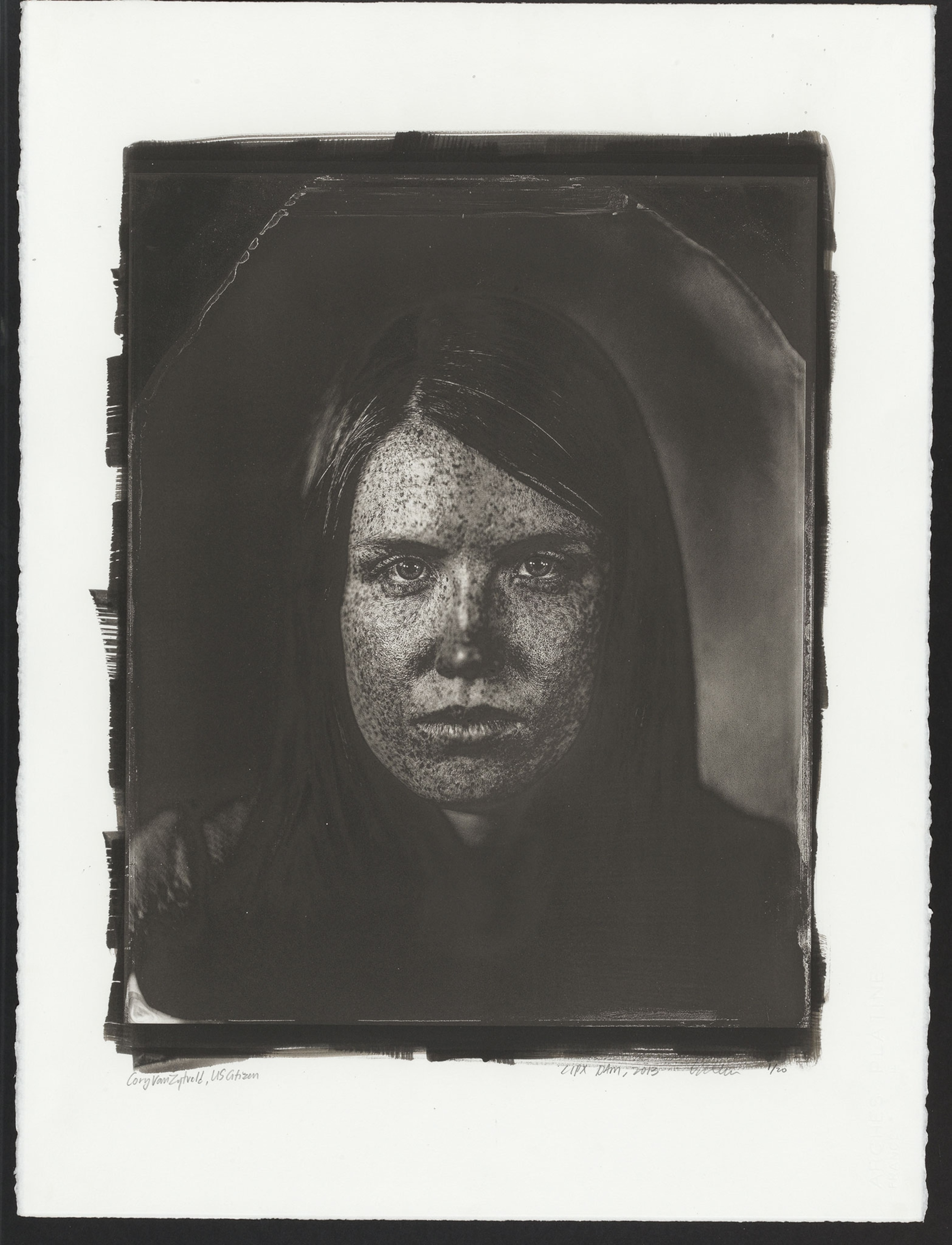 Cory Van Zytveld, a woman with red hair and freckles, seen in black and white