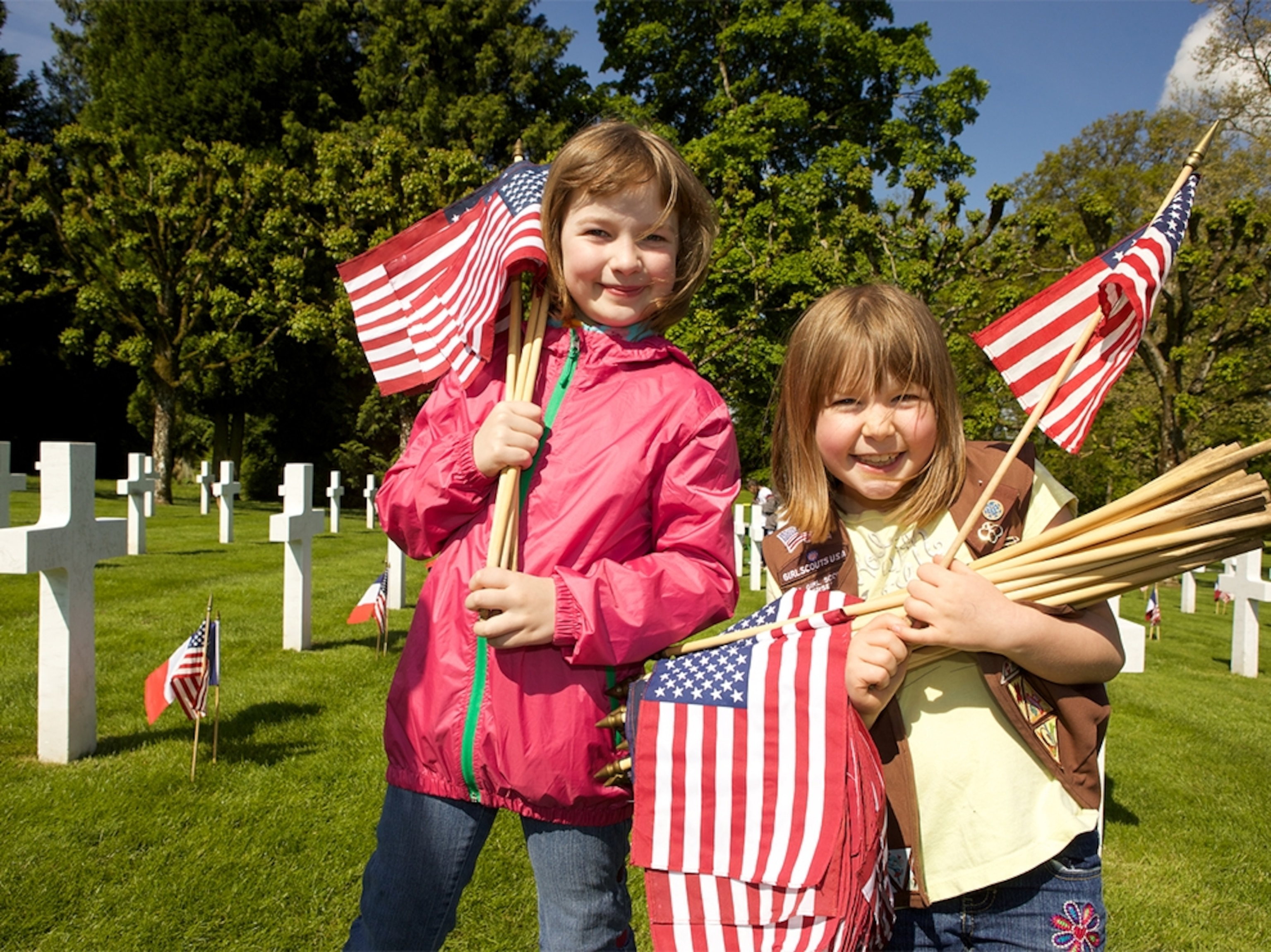 Girl Scouts planting flags at the Meuse-Argonne American cemetery in France