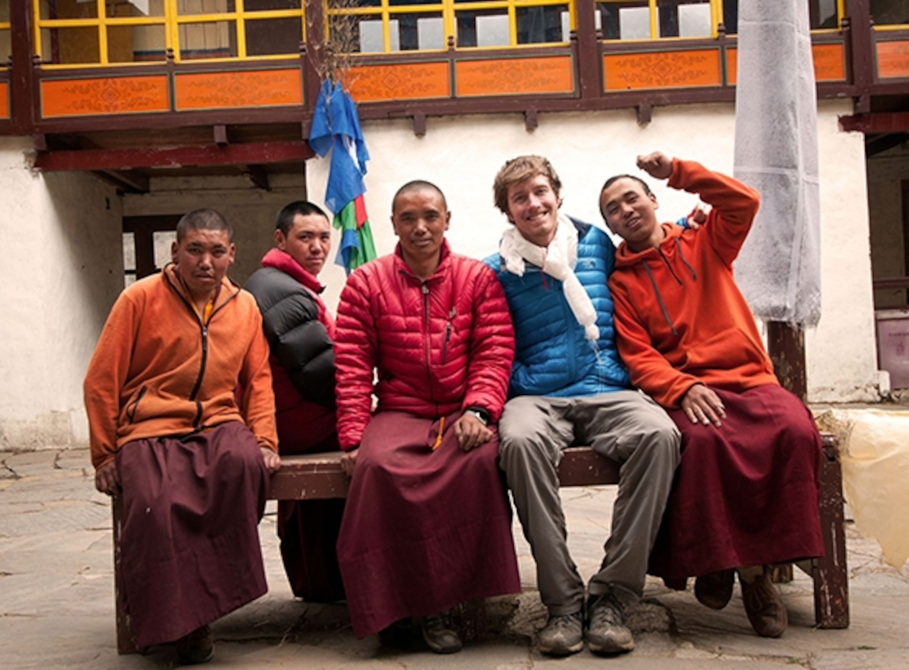 Max sits with a group of monks at a monastery in the Khumbu region of Nepal during his field work for his National Geographic Young Explorers Grant project in 2012. (Photograph courtesy Max Lowe)