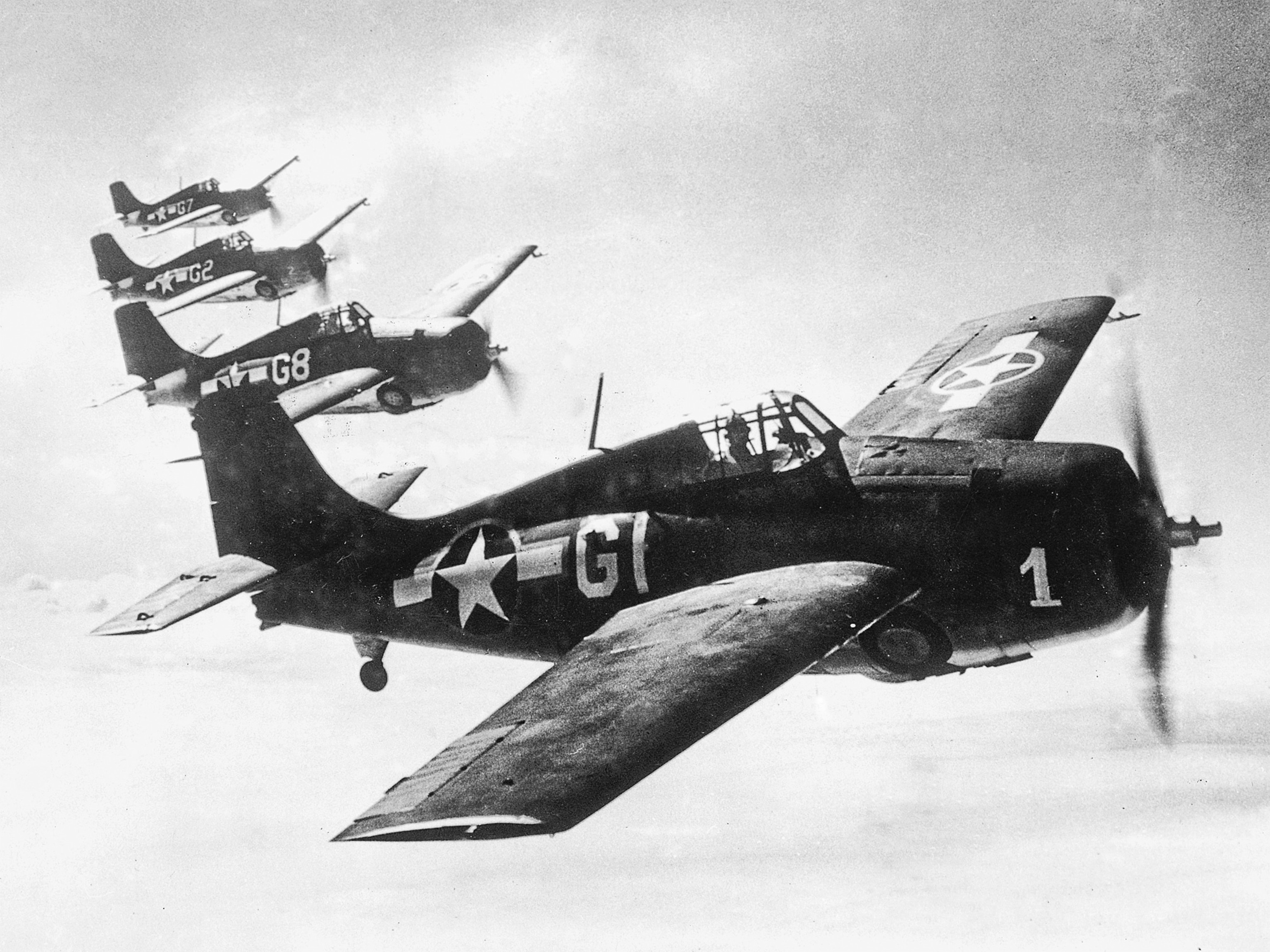 F4F Wildcat fighters flying in formation, 1943.