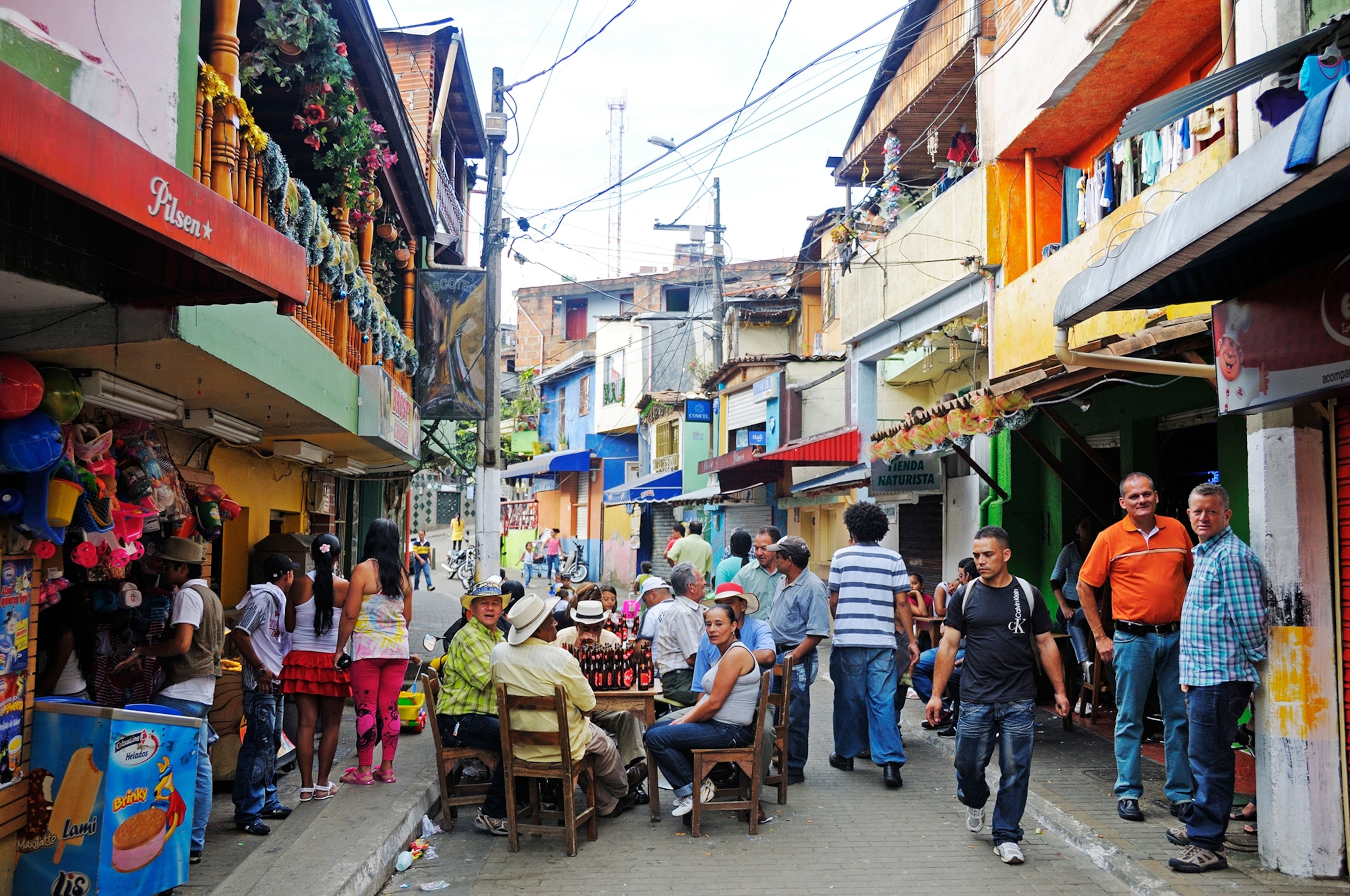 People celebrating in the streets, slums, Comuna 13, Medellin, Colombia, South America, Latin America, America.