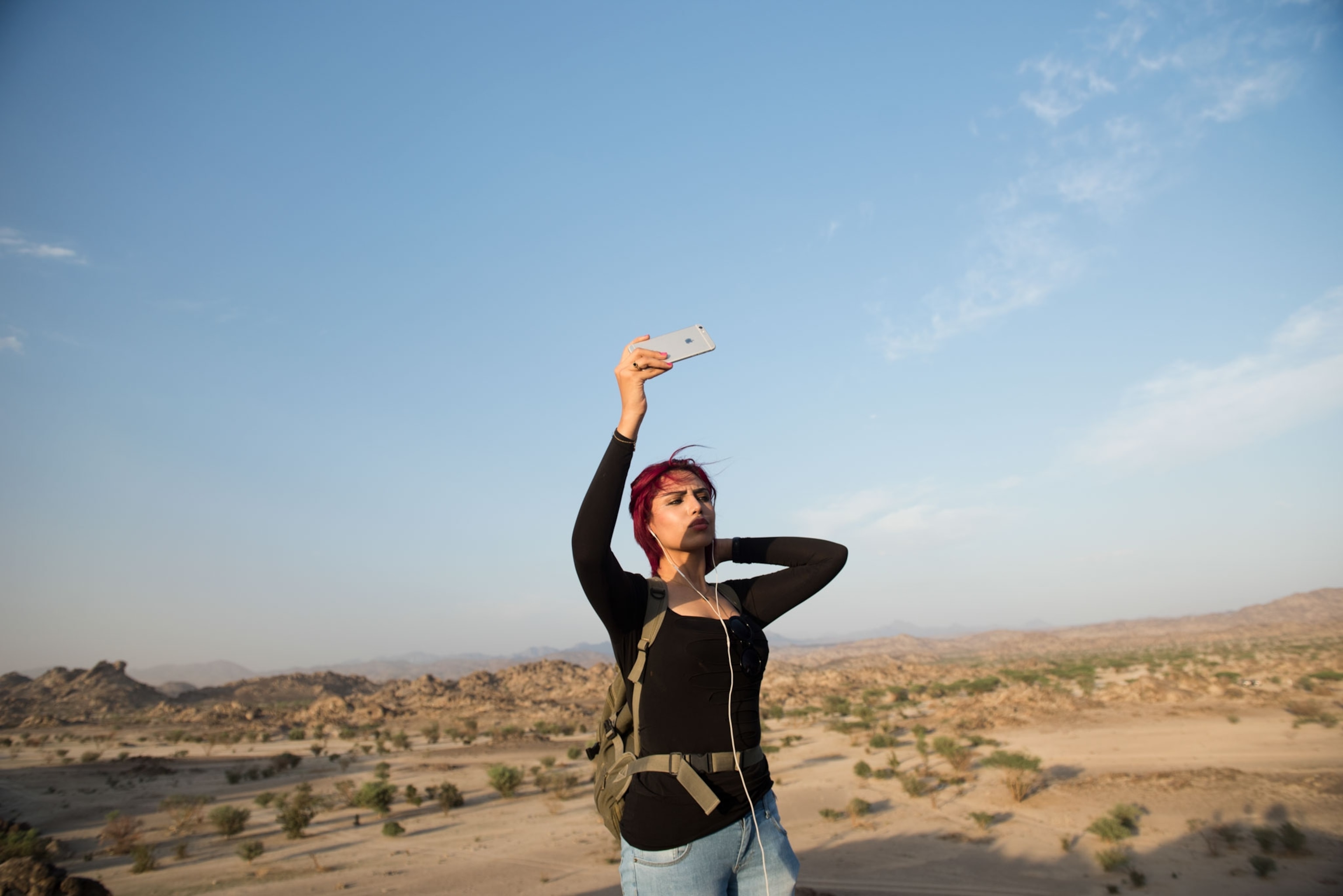 a woman on a hike in Saudi Arabia