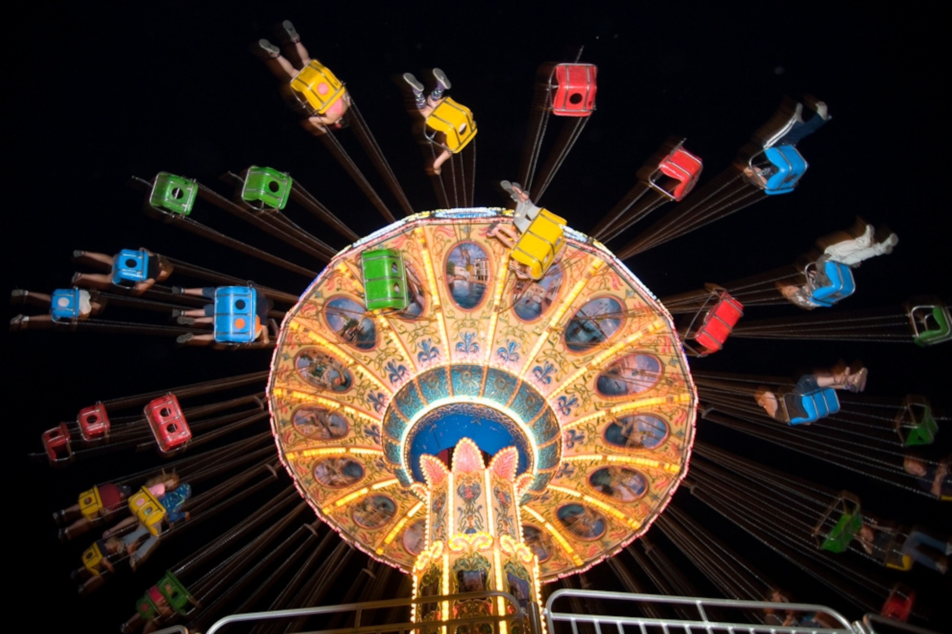 an amusement park ride at night