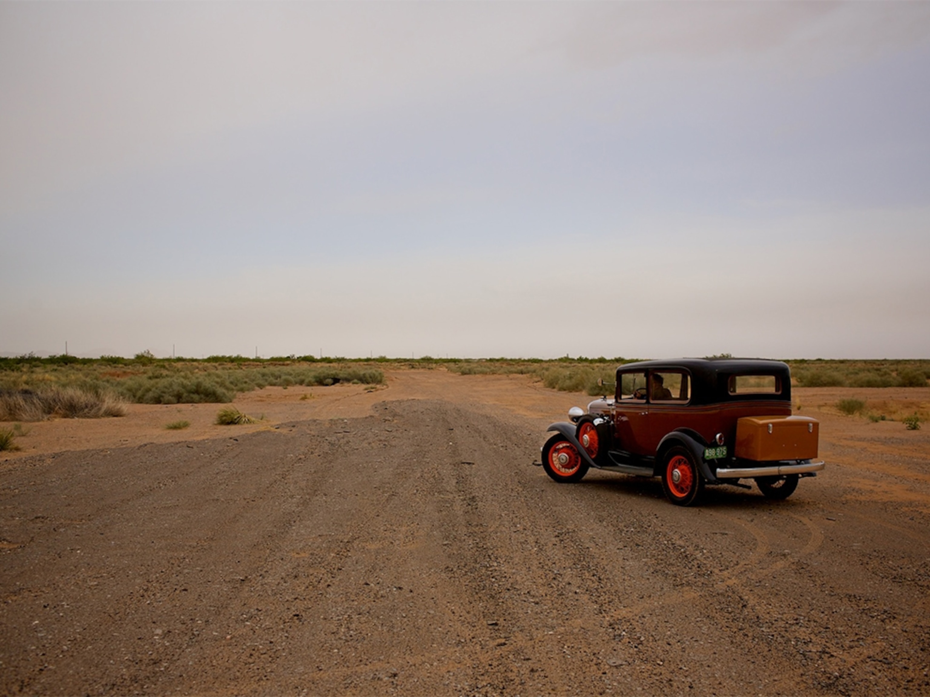 a 1932 Chevy on a disused road in New Mexico