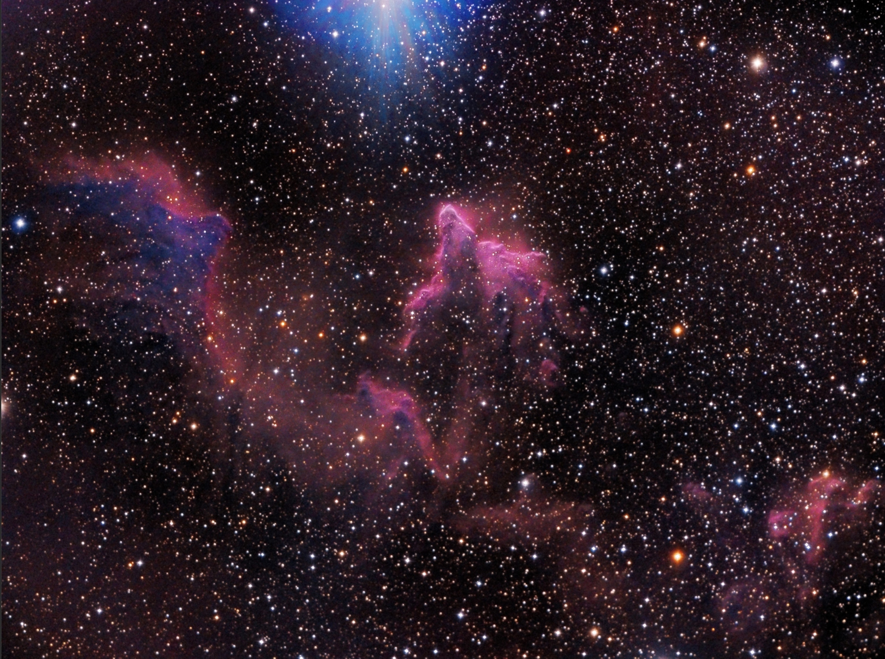 The gantry arms begin to close around the Soyuz TMA-12M spacecraft to secure the rocket at the launch pad on Sunday, March 23, 2014, at the Baikonur Cosmodrome in Kazakhstan.  Launch of the Soyuz rocket is scheduled for March 26 and will send Expedition 39 Soyuz Commander Alexander Skvortsov of the Russian Federal Space Agency, Roscosmos, Flight Engineer Steven Swanson of NASA, and Flight Engineer Oleg Artemyev of Roscosmos on a six-month mission aboard the International Space Station.  Photo Credit: (NASA/Joel Kowsky)