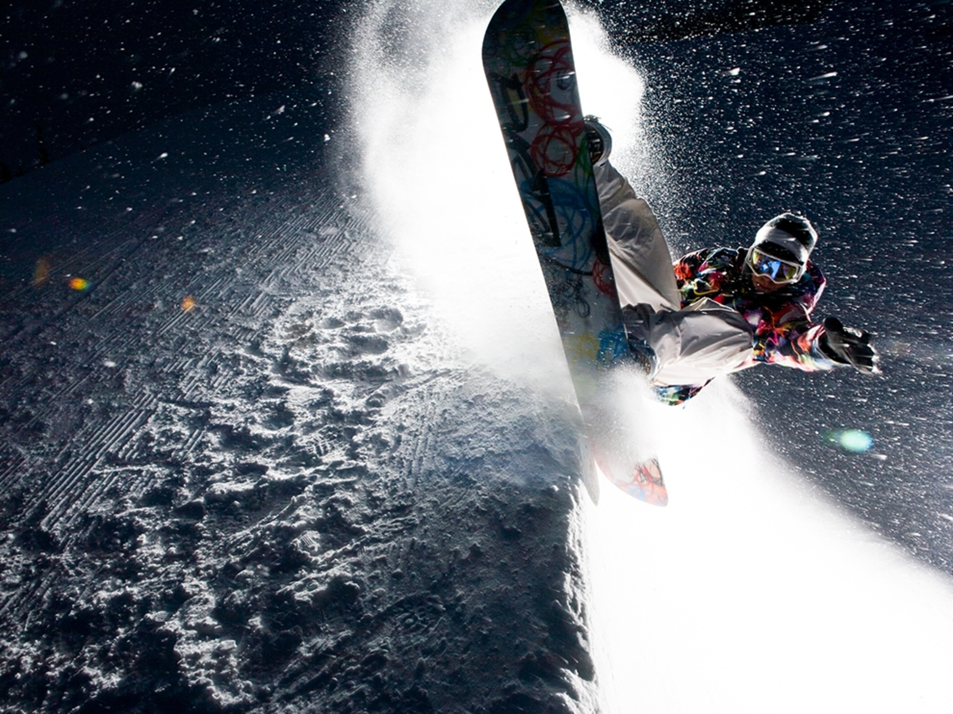 Kevin Pearce snowboarding at night