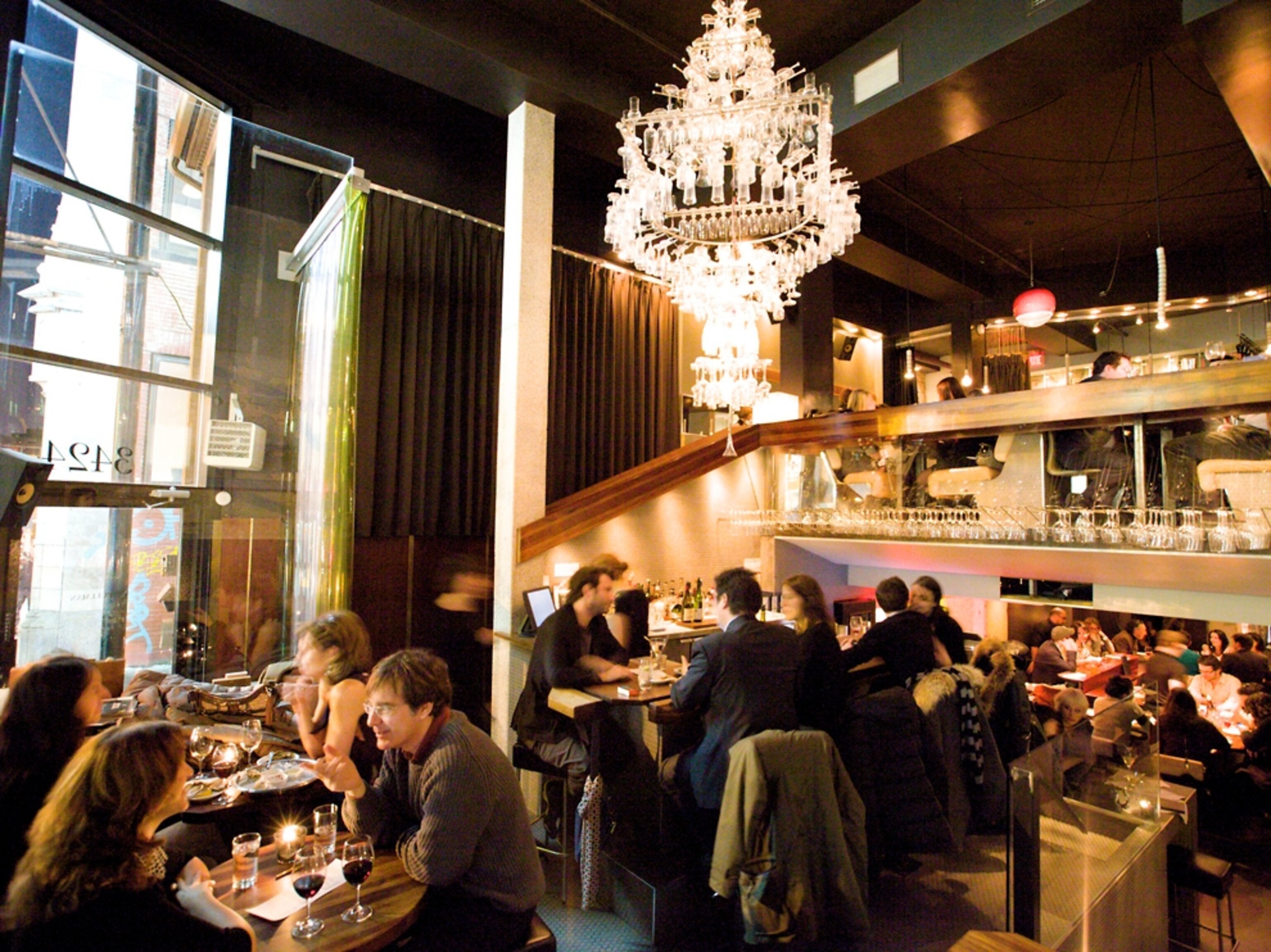 Dining under a chandelier