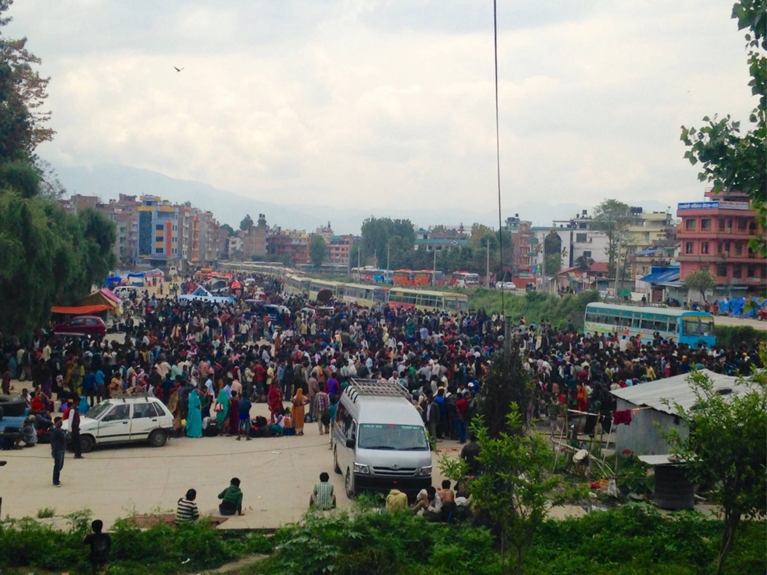 Hoards of people trying to leave Kathmandu; Photograph by Libby Sauter