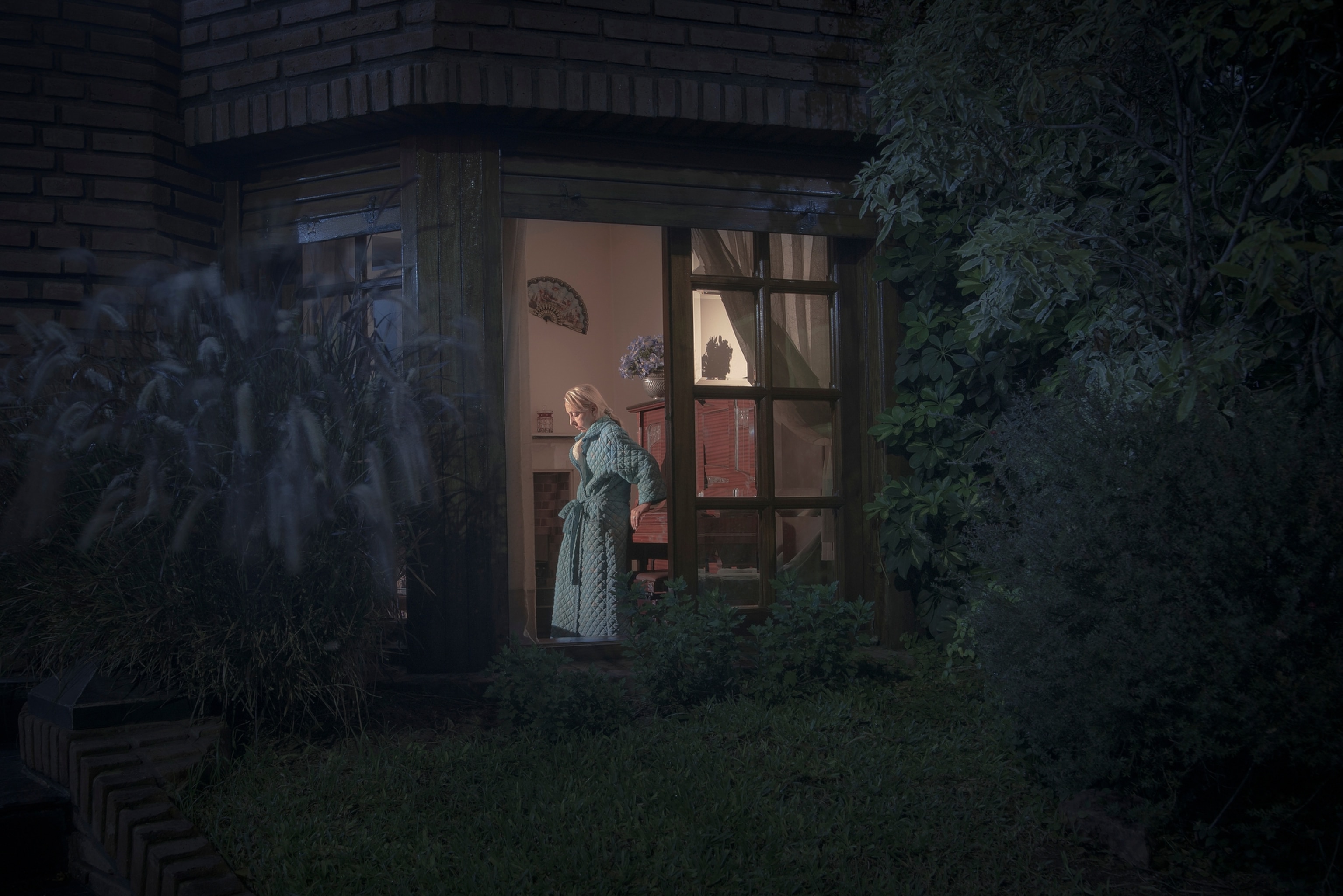 woman seen through window