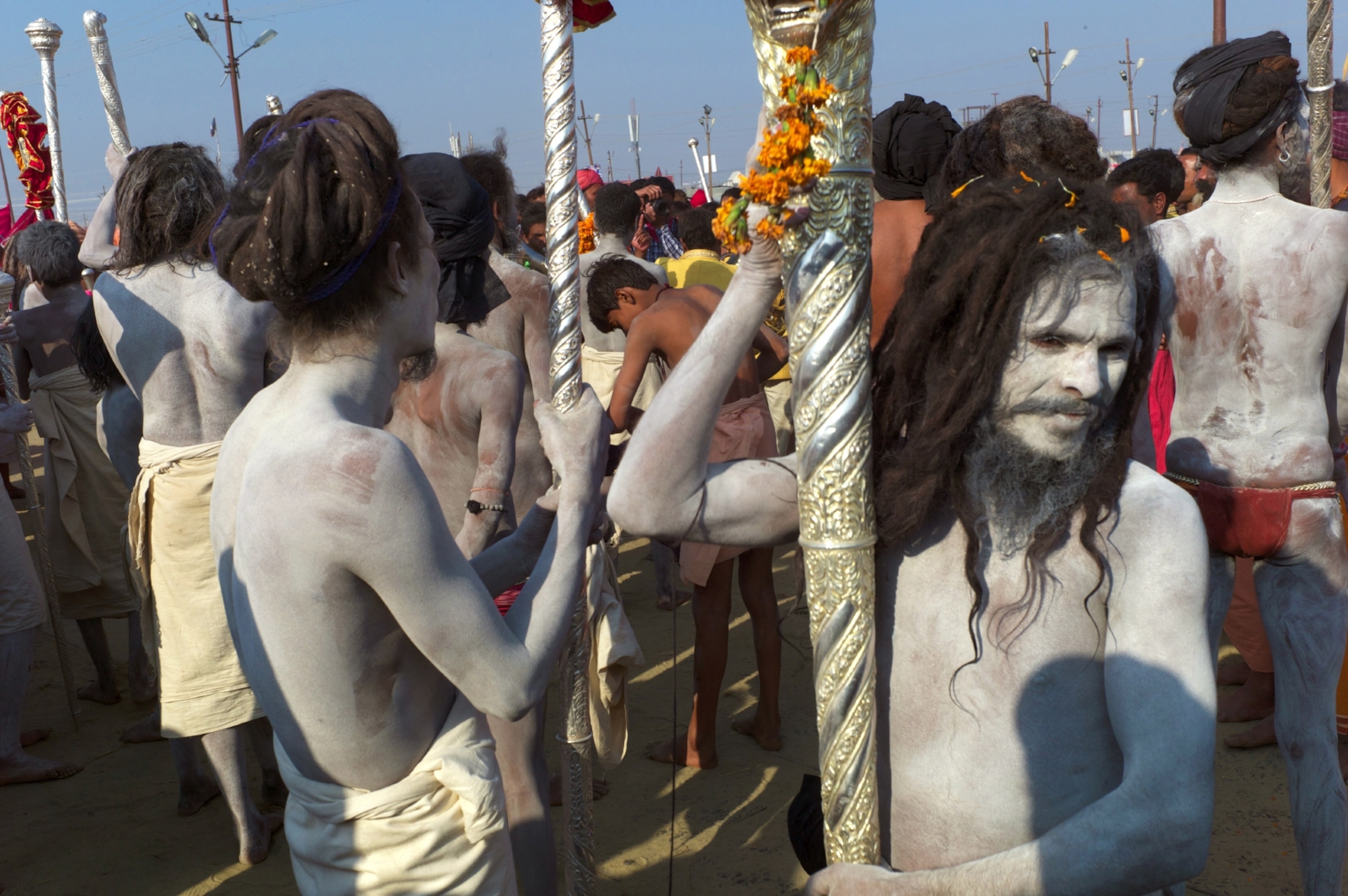 Naga Sadhus, holy men who are followers of the Hindu deity Shiva, enroute to the bathe in the water.