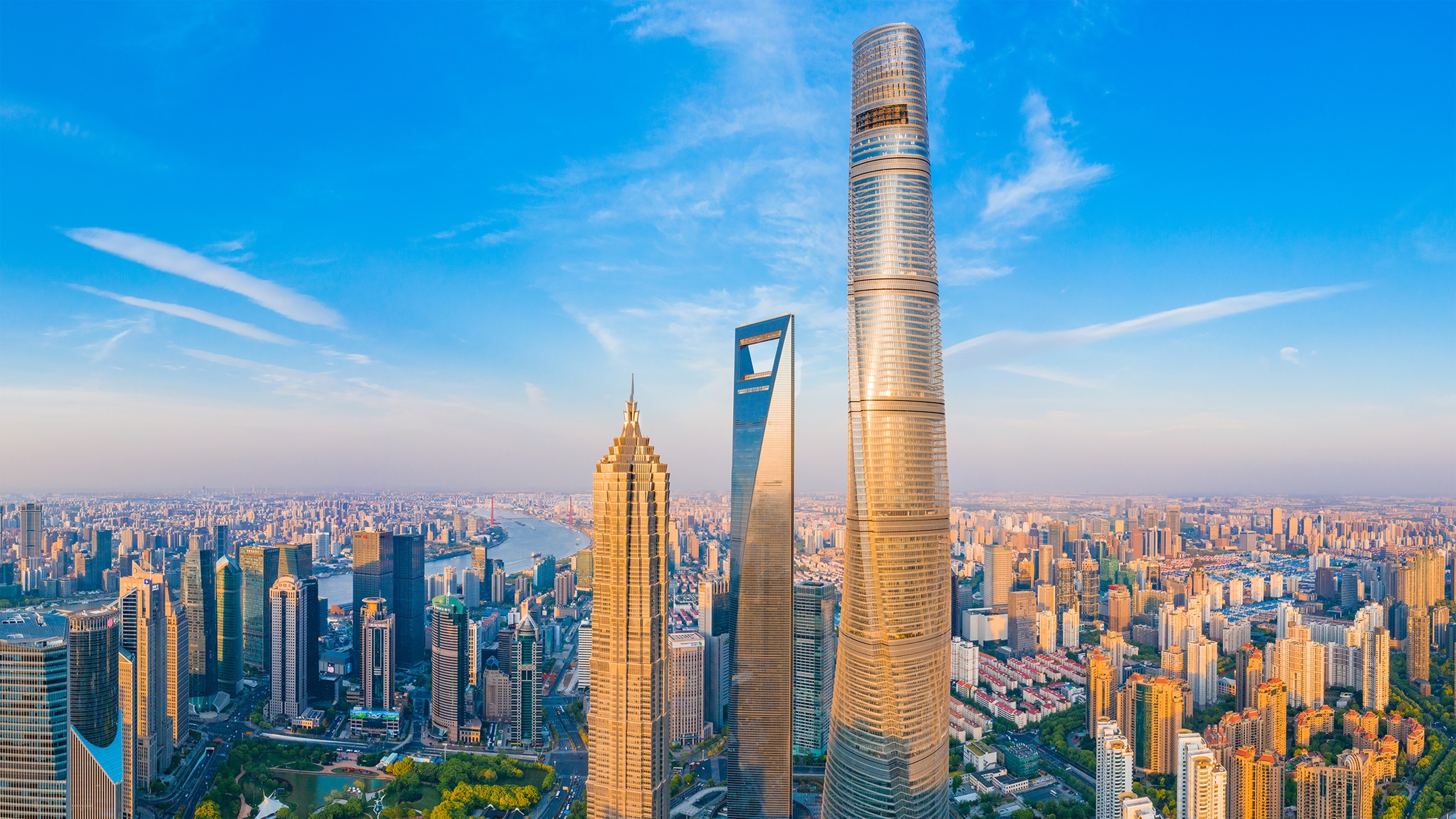 Dwarfing even its skyscraping neighbors, the Shanghai Tower (far right) dominating the city skyline.