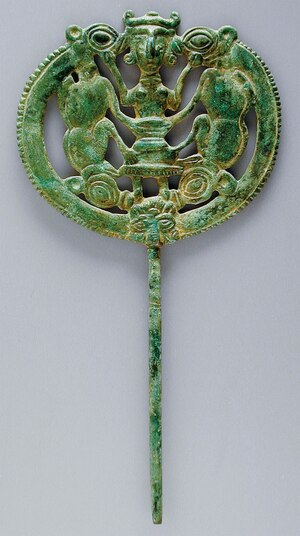 Male and female figures have been featured in &ldquo;Master of Animals&rdquo; artworks, like this circa 1000-650 B.C. openwork bronze pin from Luristan.