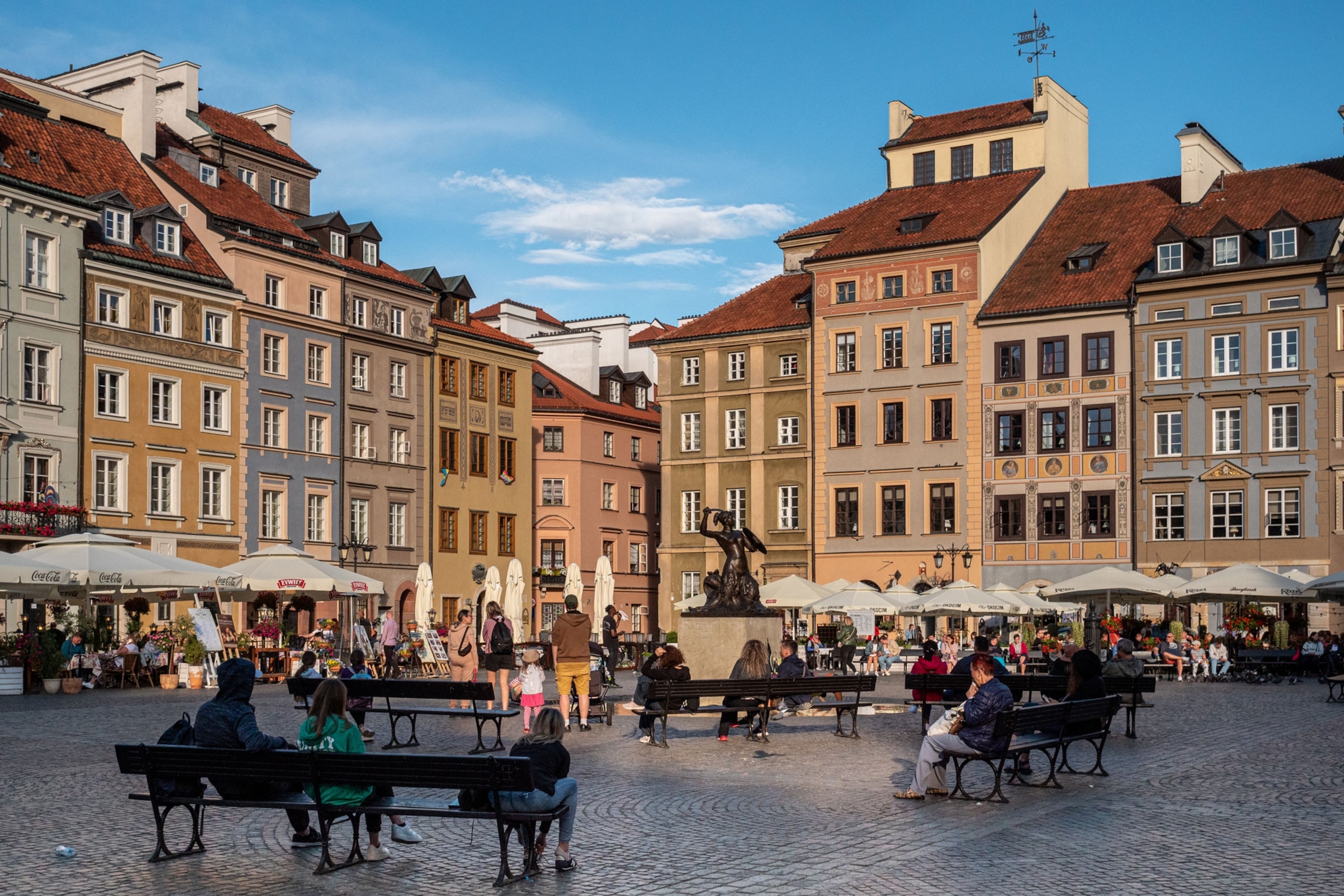 Warsaw Old Town's yellow and orange buildings in the town square