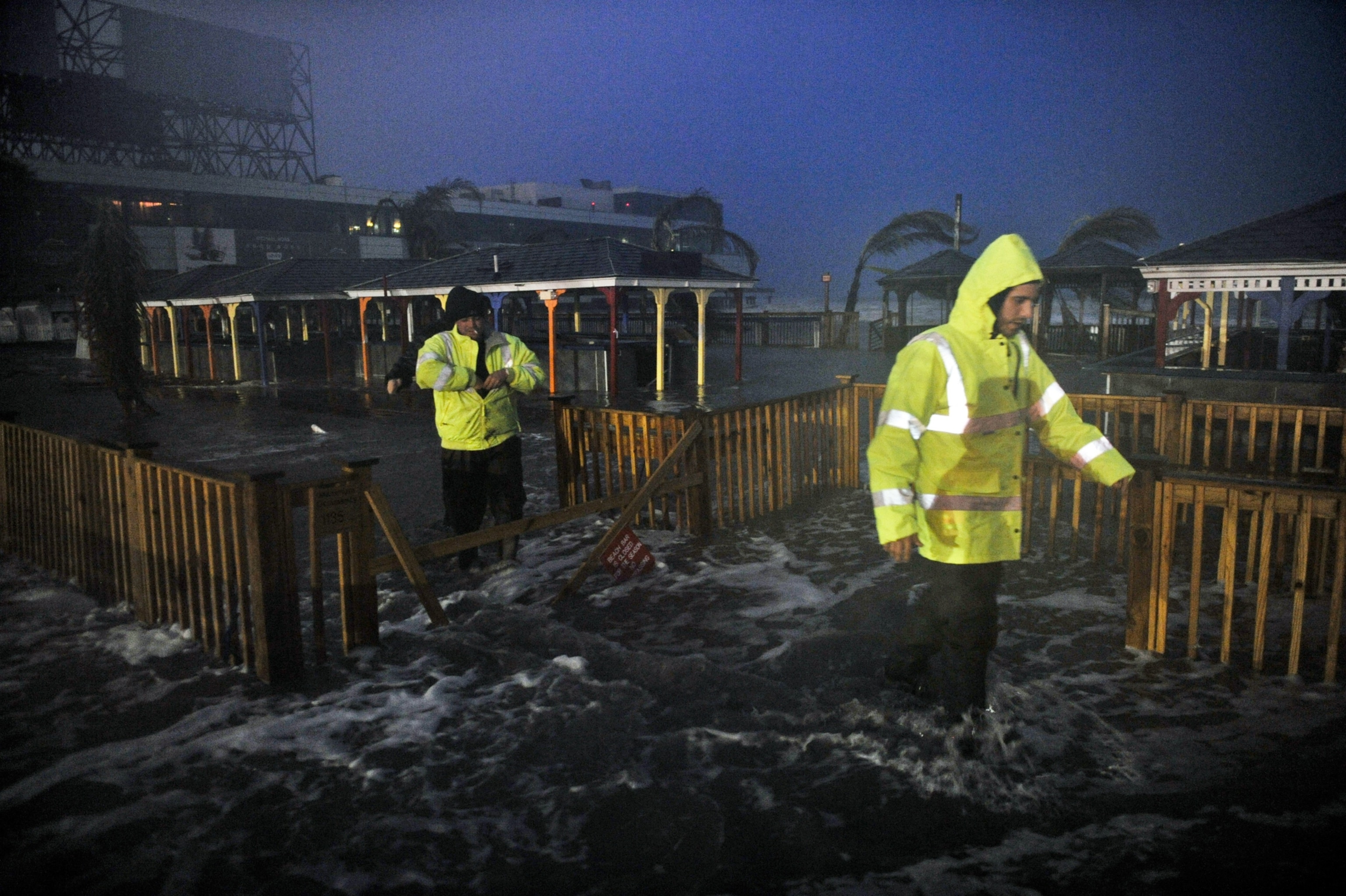 people walking through water