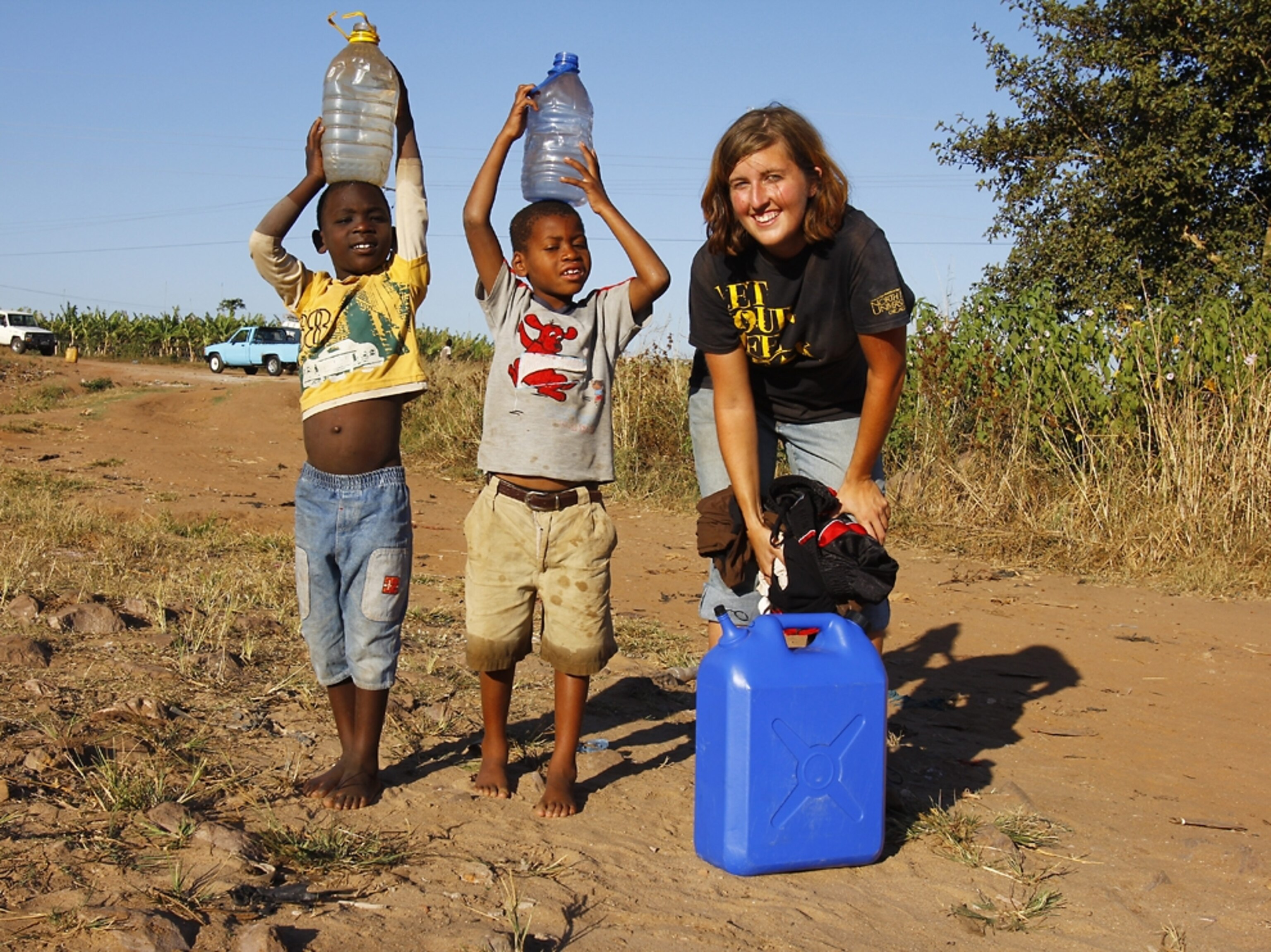 Amy Russell with children in Africa