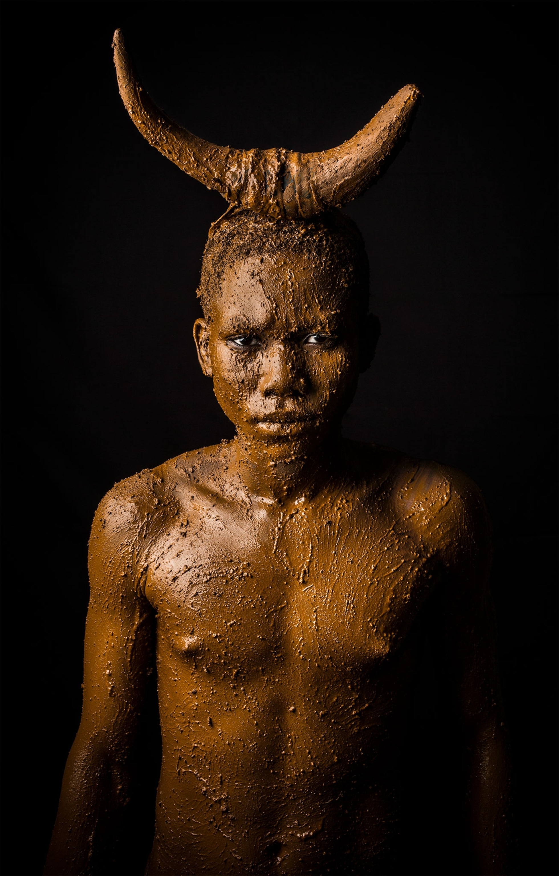 a man in a costume with horns