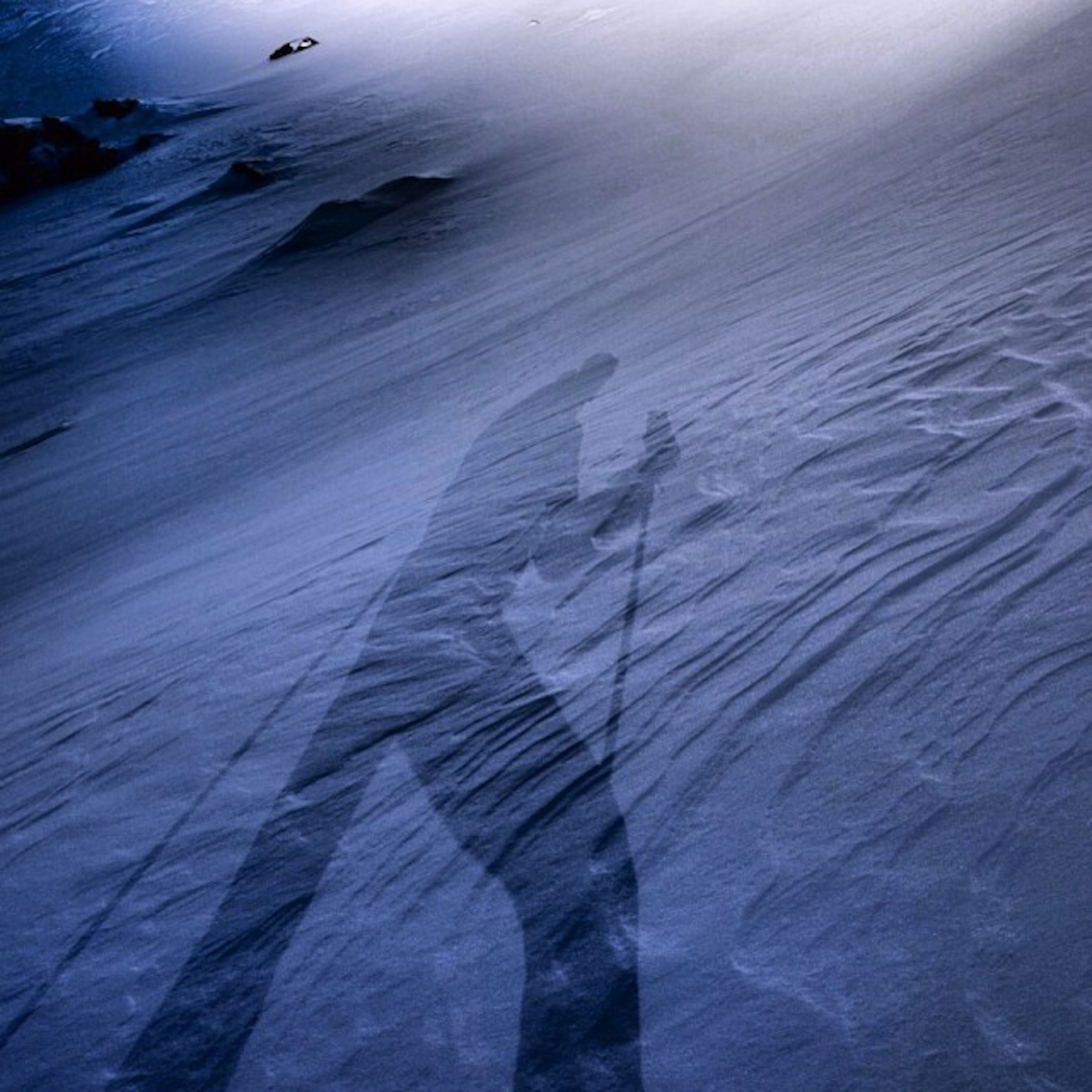 a shadow on snow