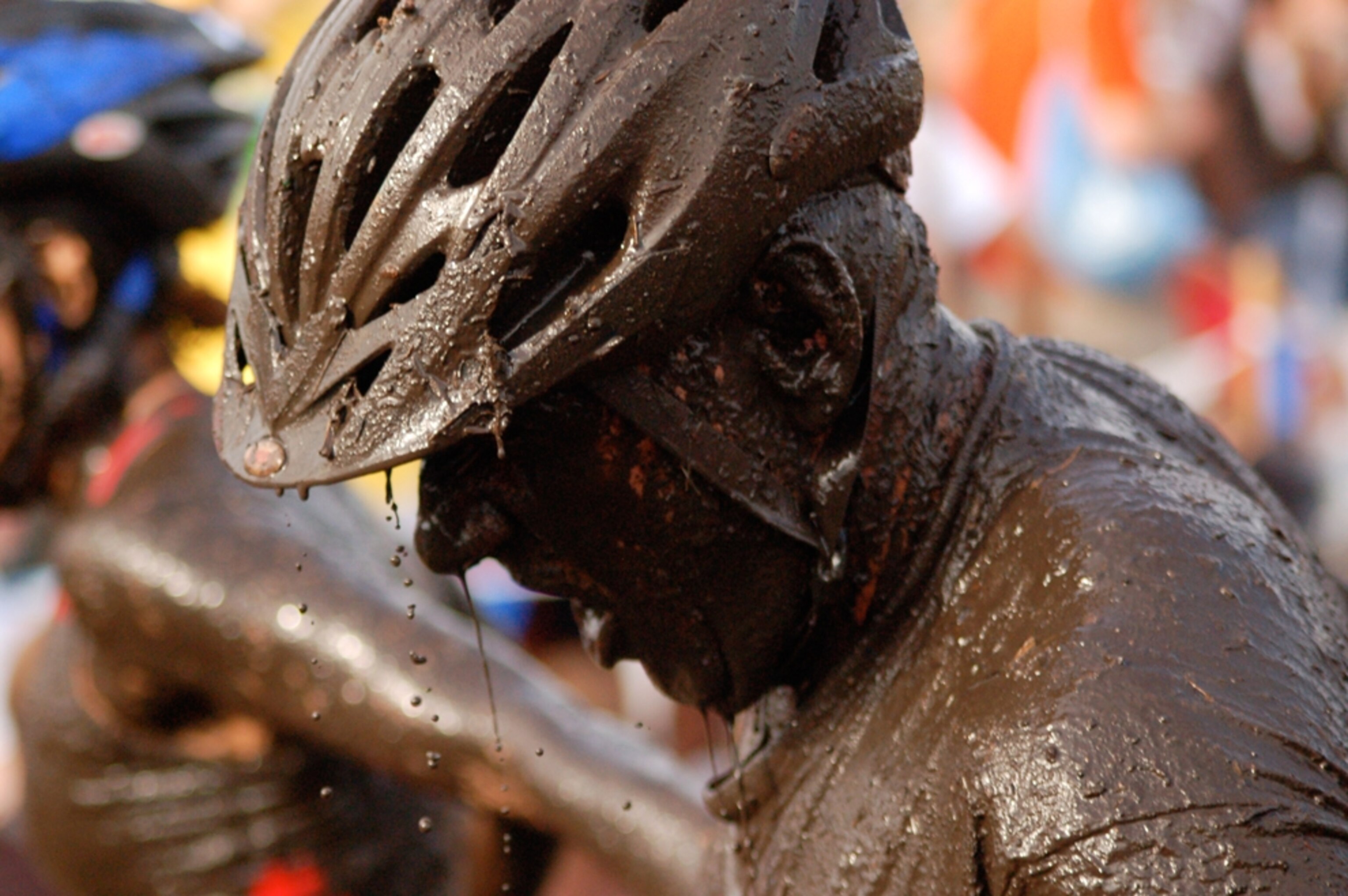 Muddy Buddy race competitor covered in mud