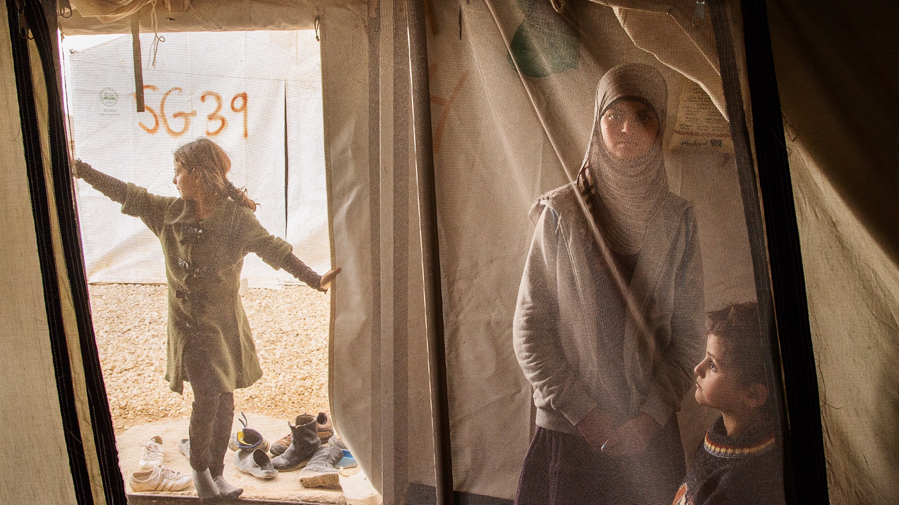 refugees in their camp in Dohuk, Iraq.