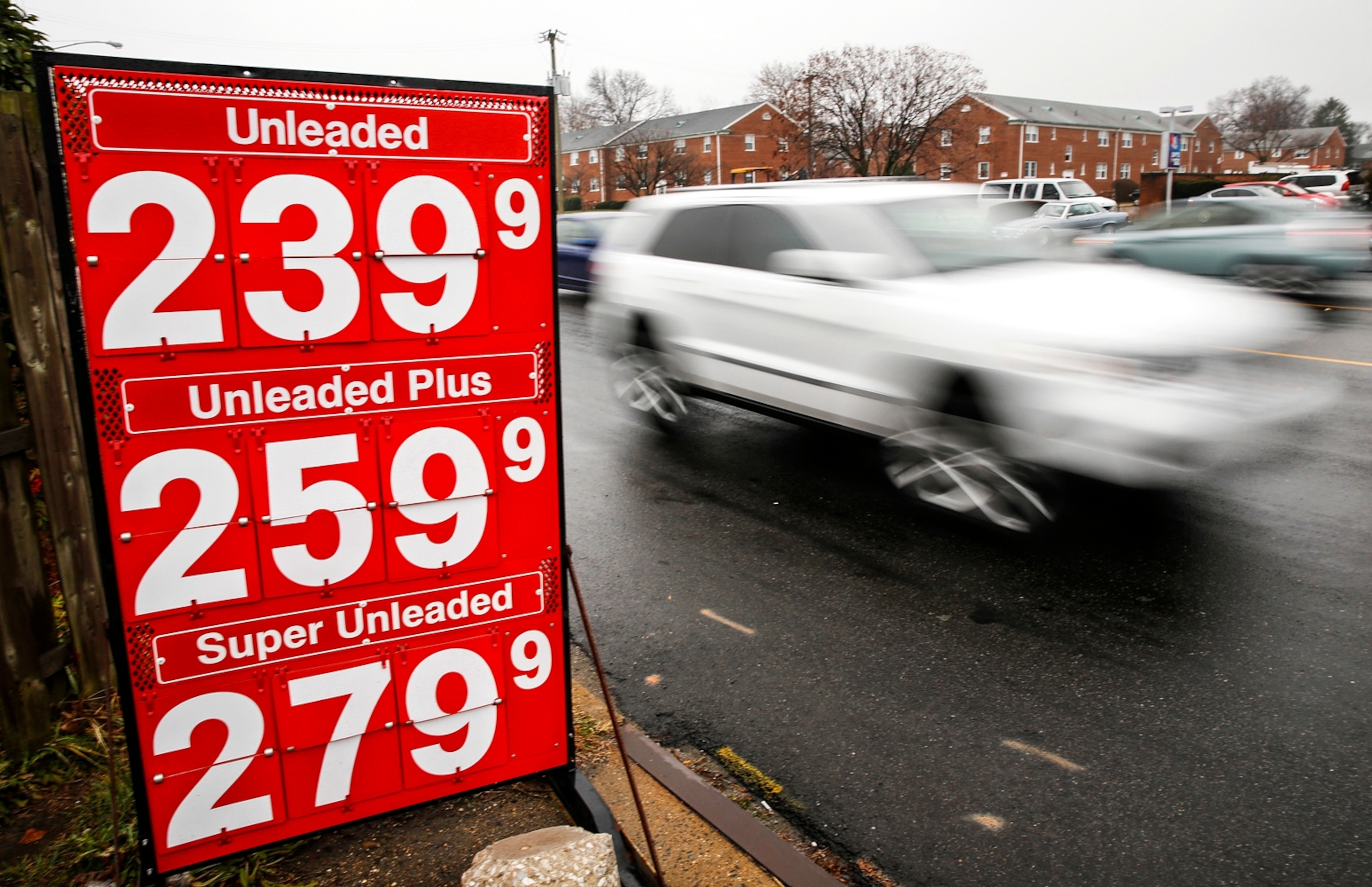 car passing a price sign in Virginia