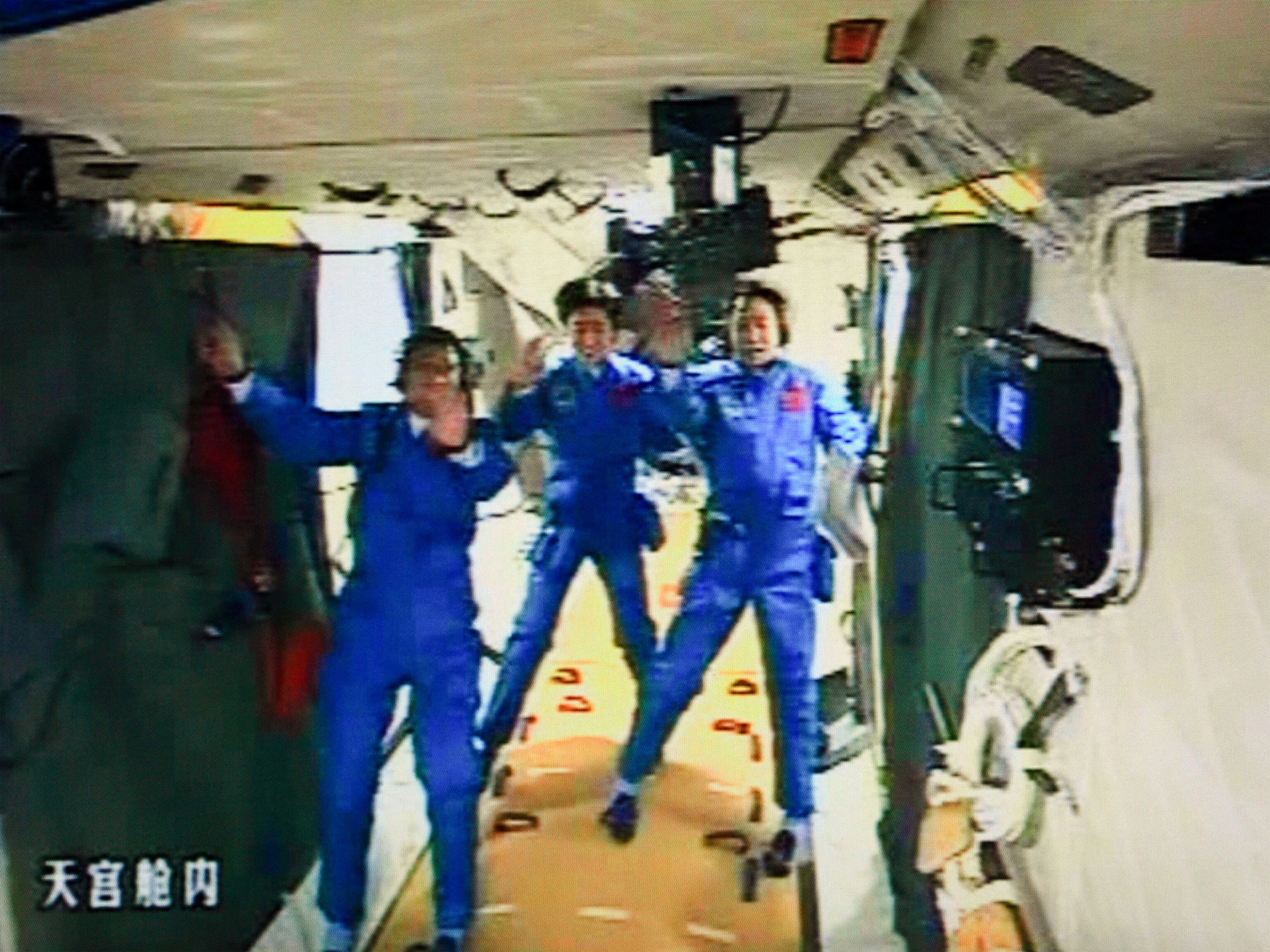 Space picture: A video still showing Chinese astronauts in an orbiting module
