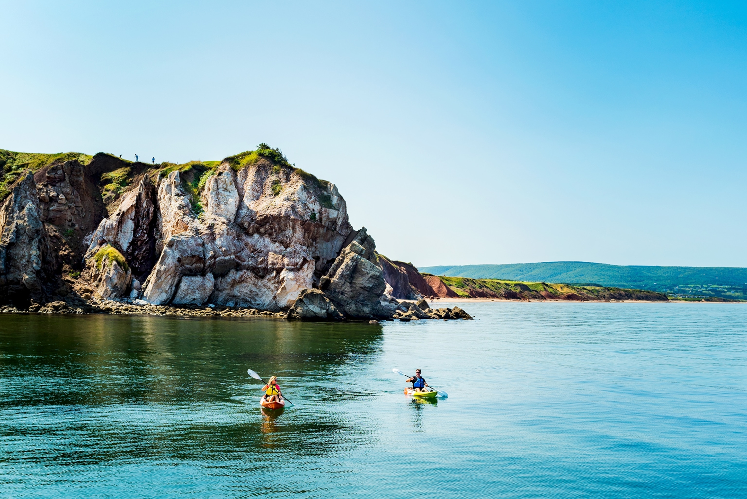 people kayaking in Ingonish Beach