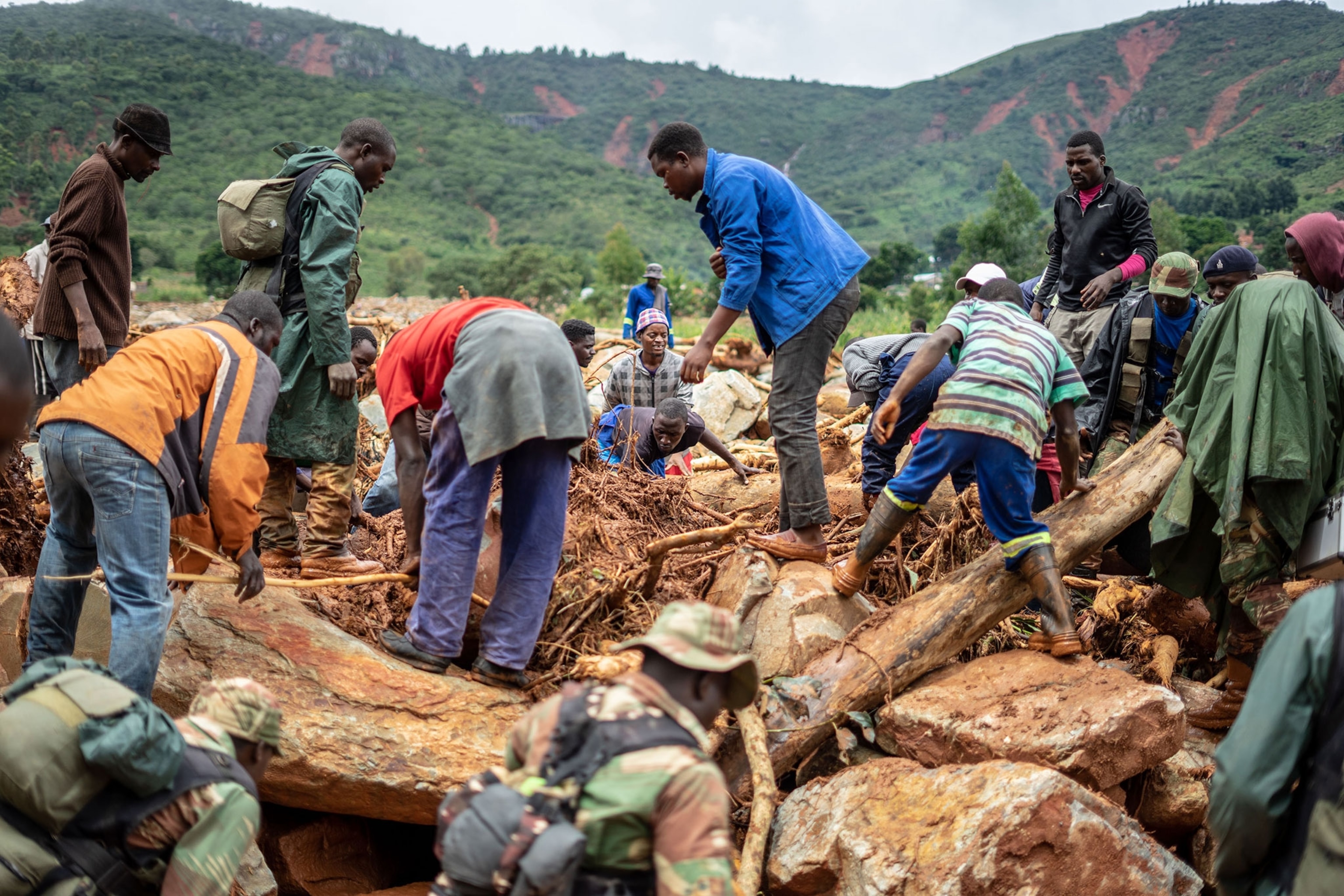 people searching for bodies