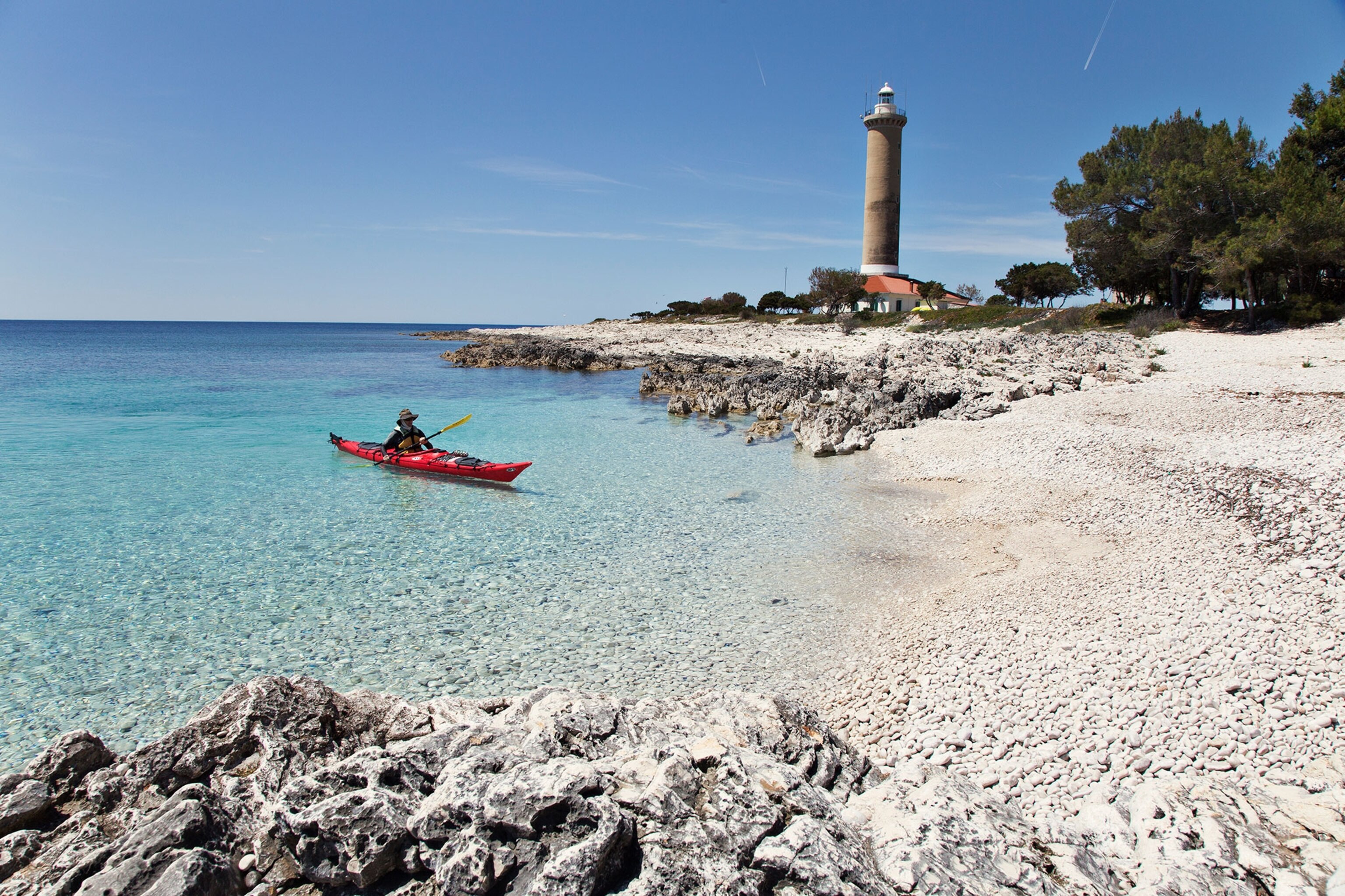a sea kayaker paddling in Croatia