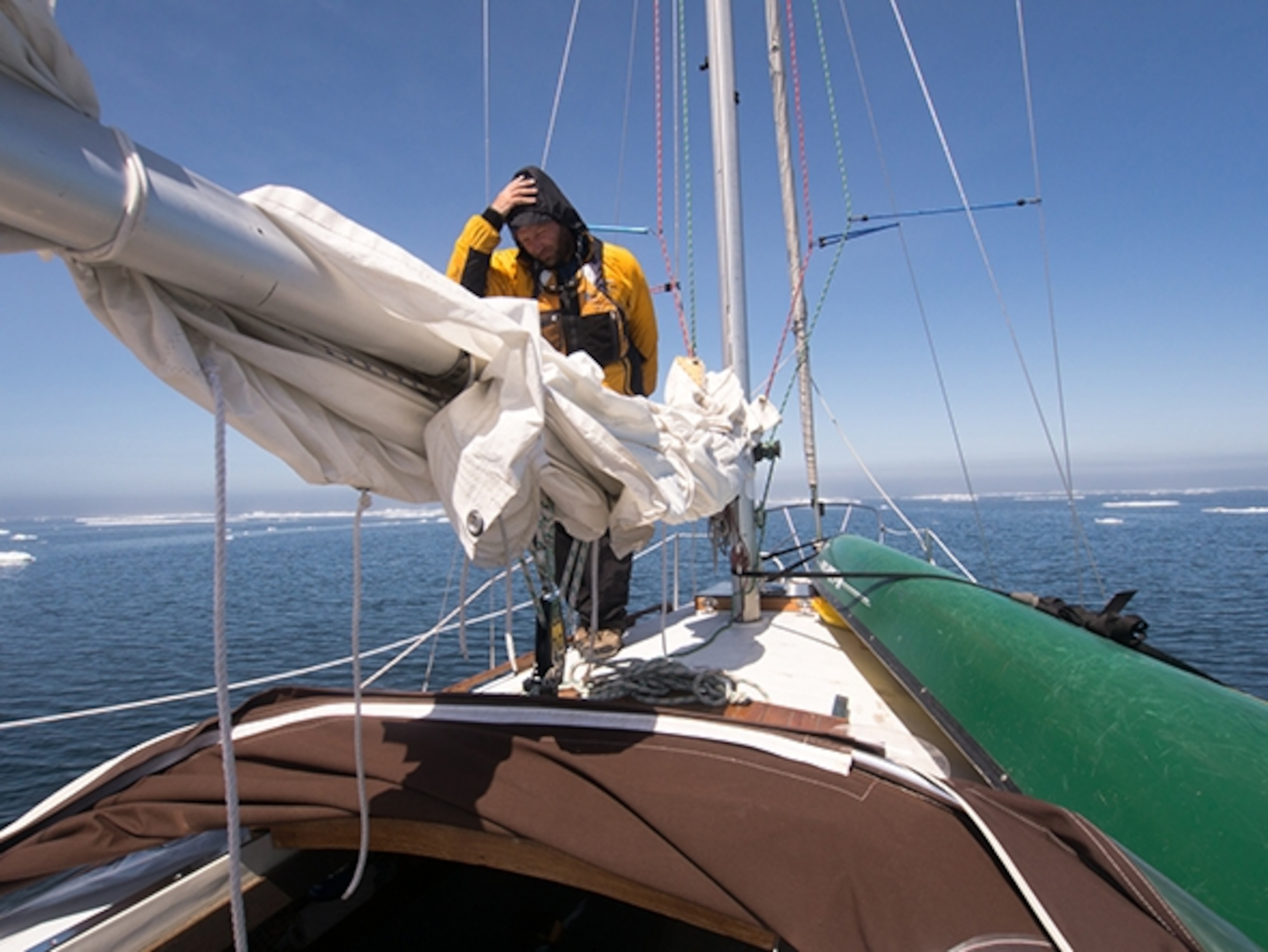 Dave Freeman returns to the cockpit discouraged by the wall of ice stretching to the horizon; Photograph by Amy Freeman