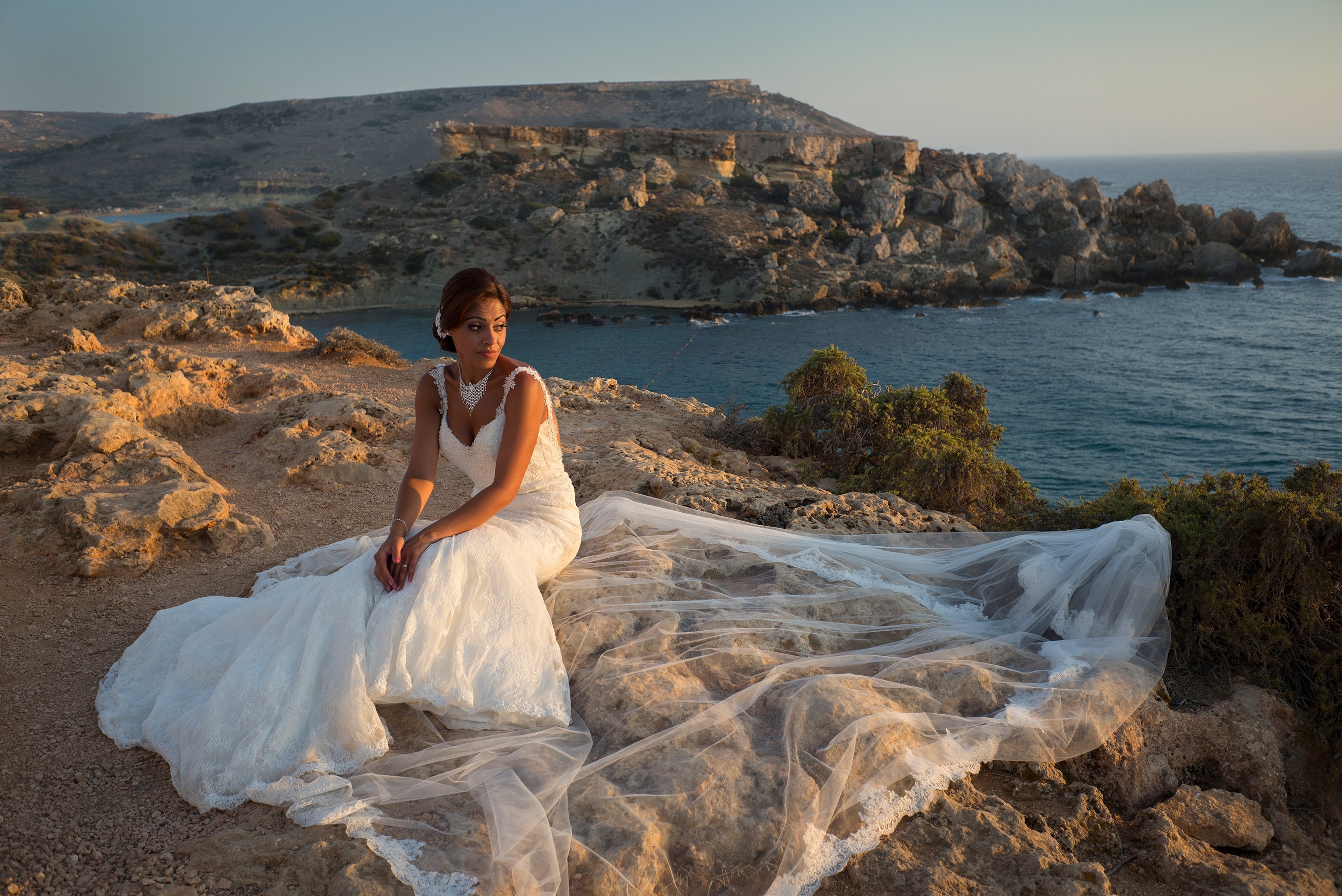 a bride near the seaside cliffs, Malta